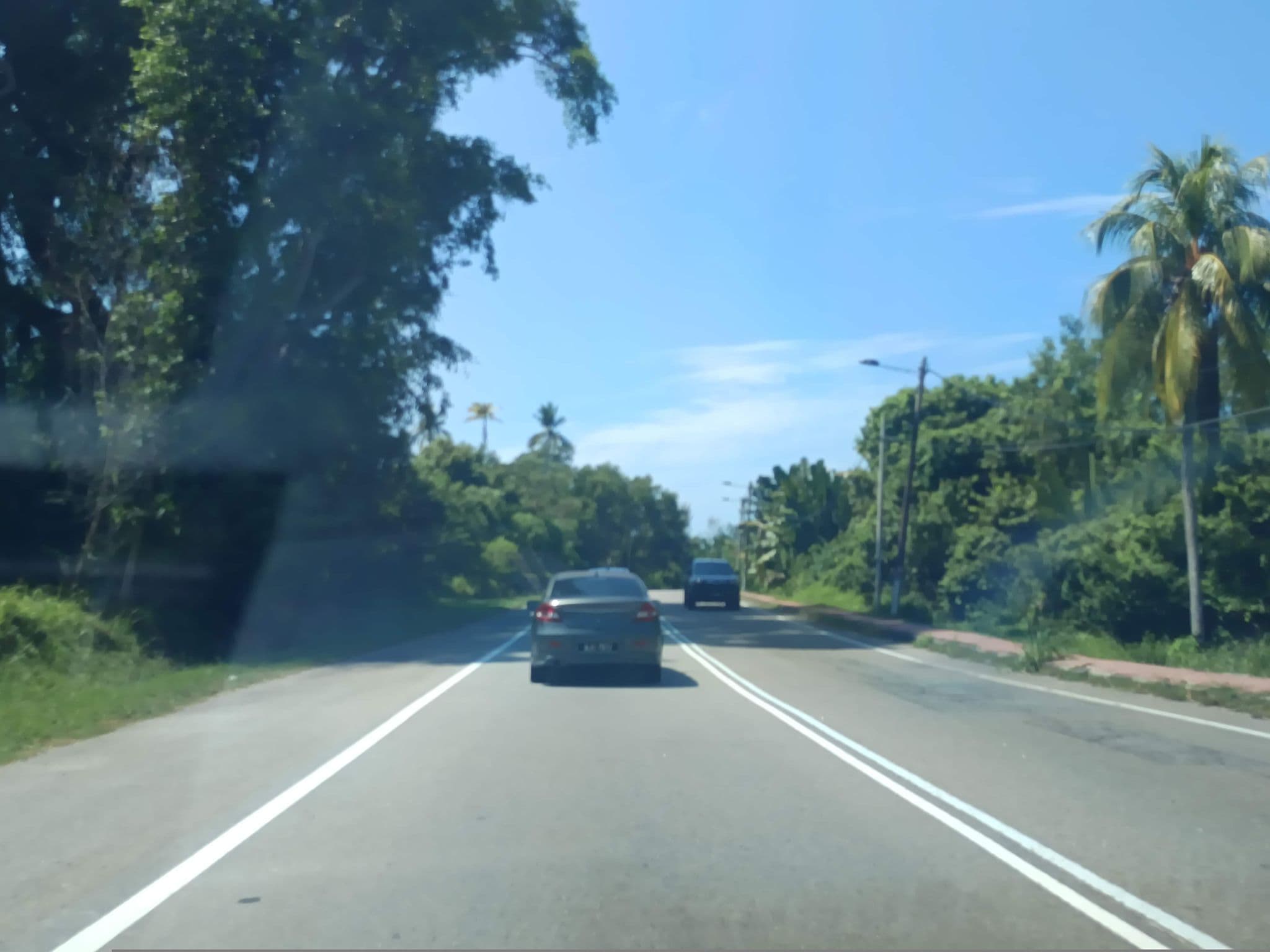 Street view near Pd Guesthouse, Kampung Sirusa — © YikQin (CC BY-SA · Mapillary)