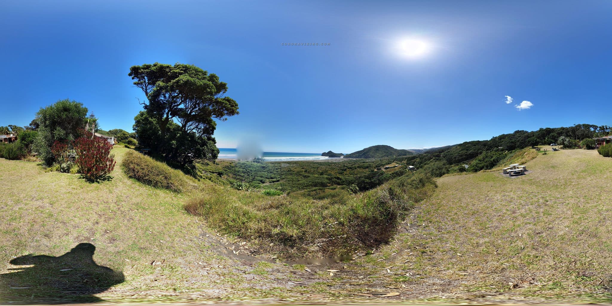 Street view near Bethells Beach Cottages, Piha — © coronaviking (CC BY-SA · Mapillary)