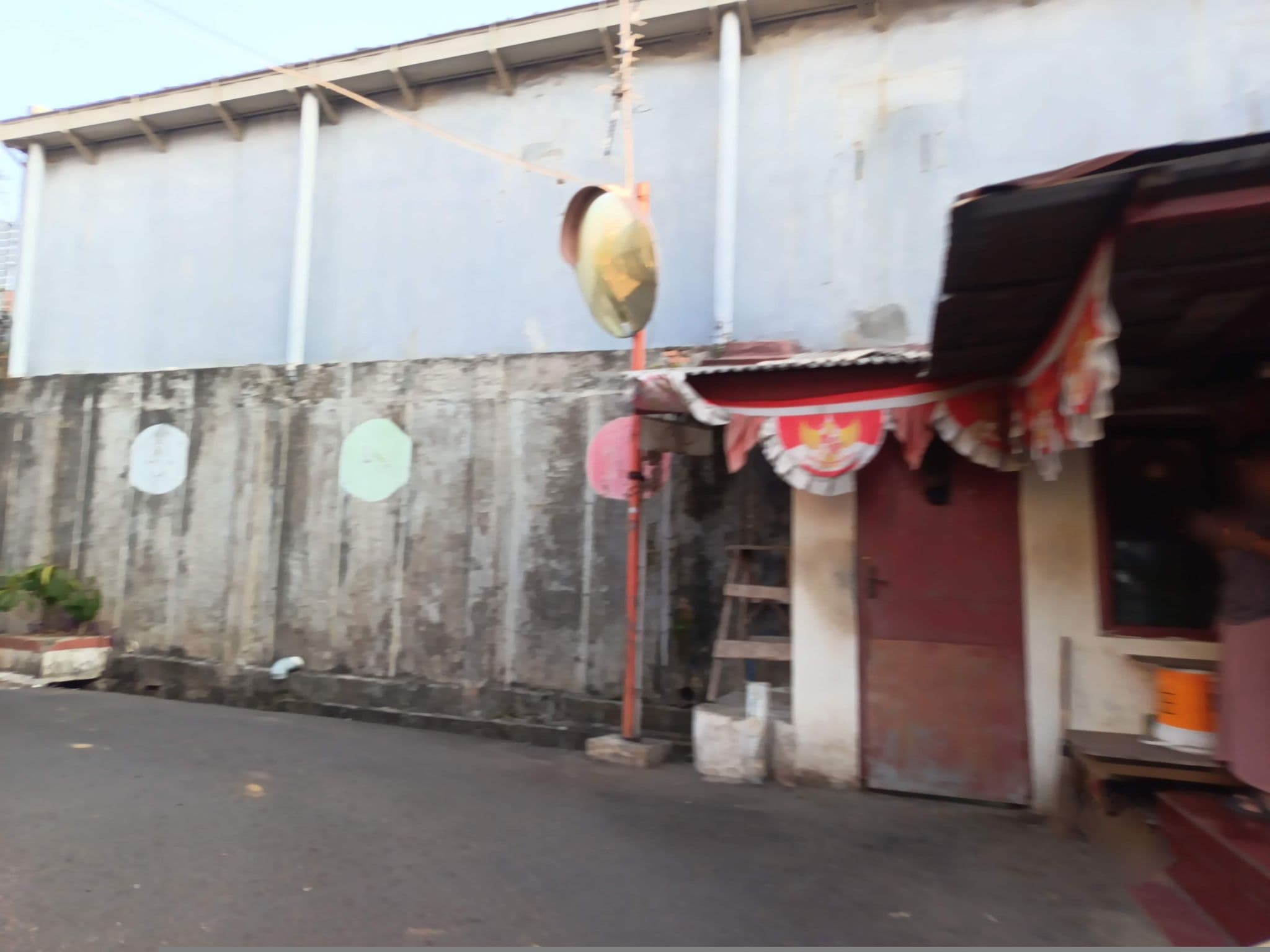 Street view near Graha Kencana Guest House, Jakarta — © adiatmad (CC BY-SA · Mapillary)