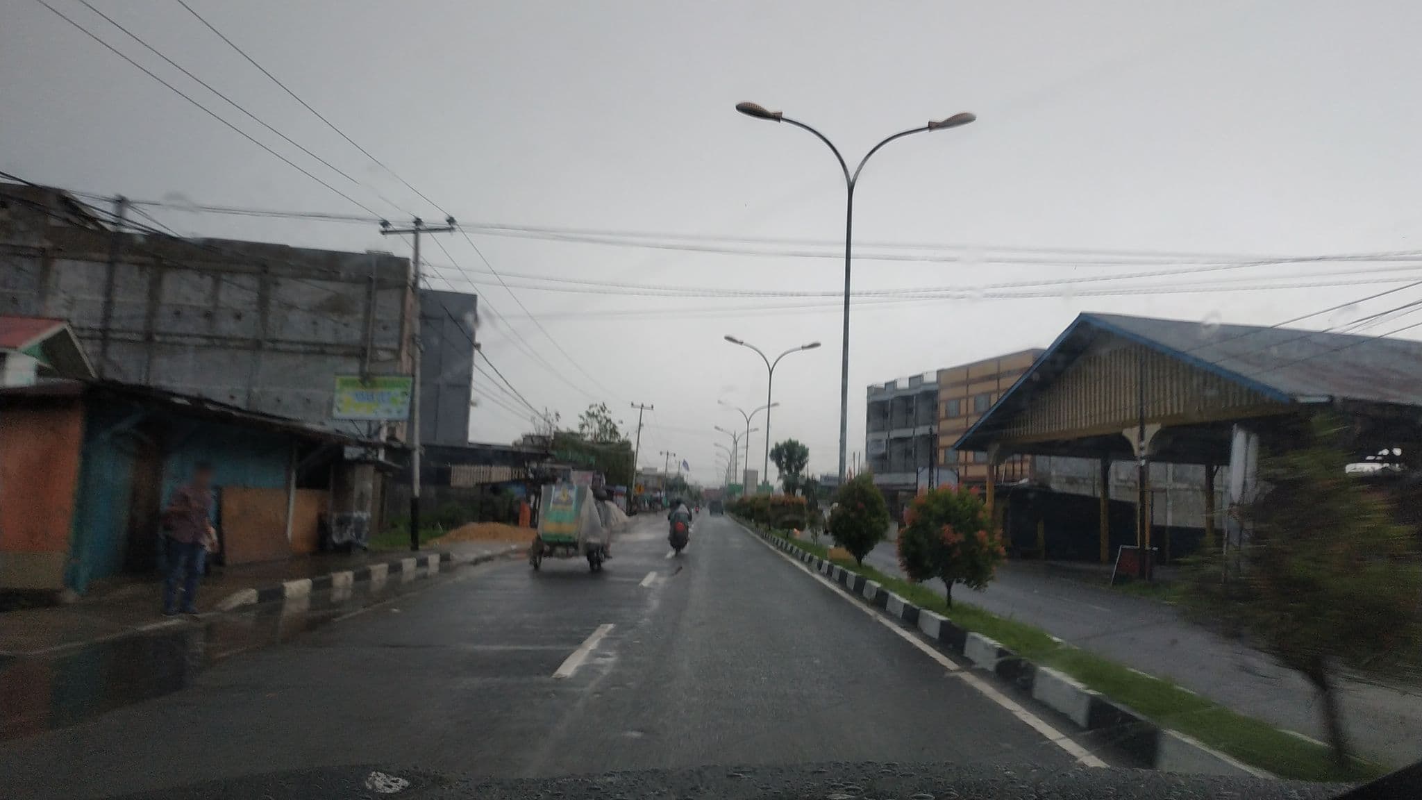 Street view near Hotel Inhil Pratama, Kuala Cenaku — © hanifarafah (CC BY-SA · Mapillary)