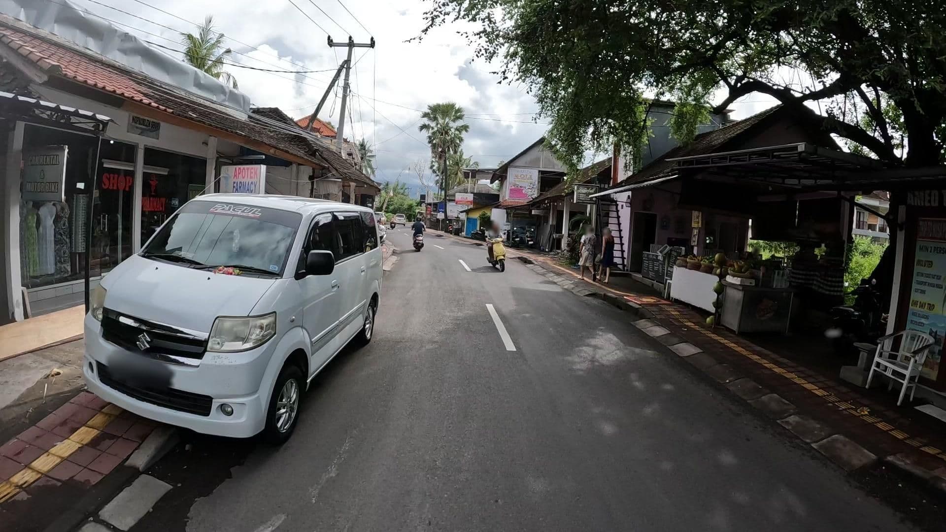 Street view near Minory Guesthouse, Amlapura — © lucomsky (CC BY-SA · Mapillary)