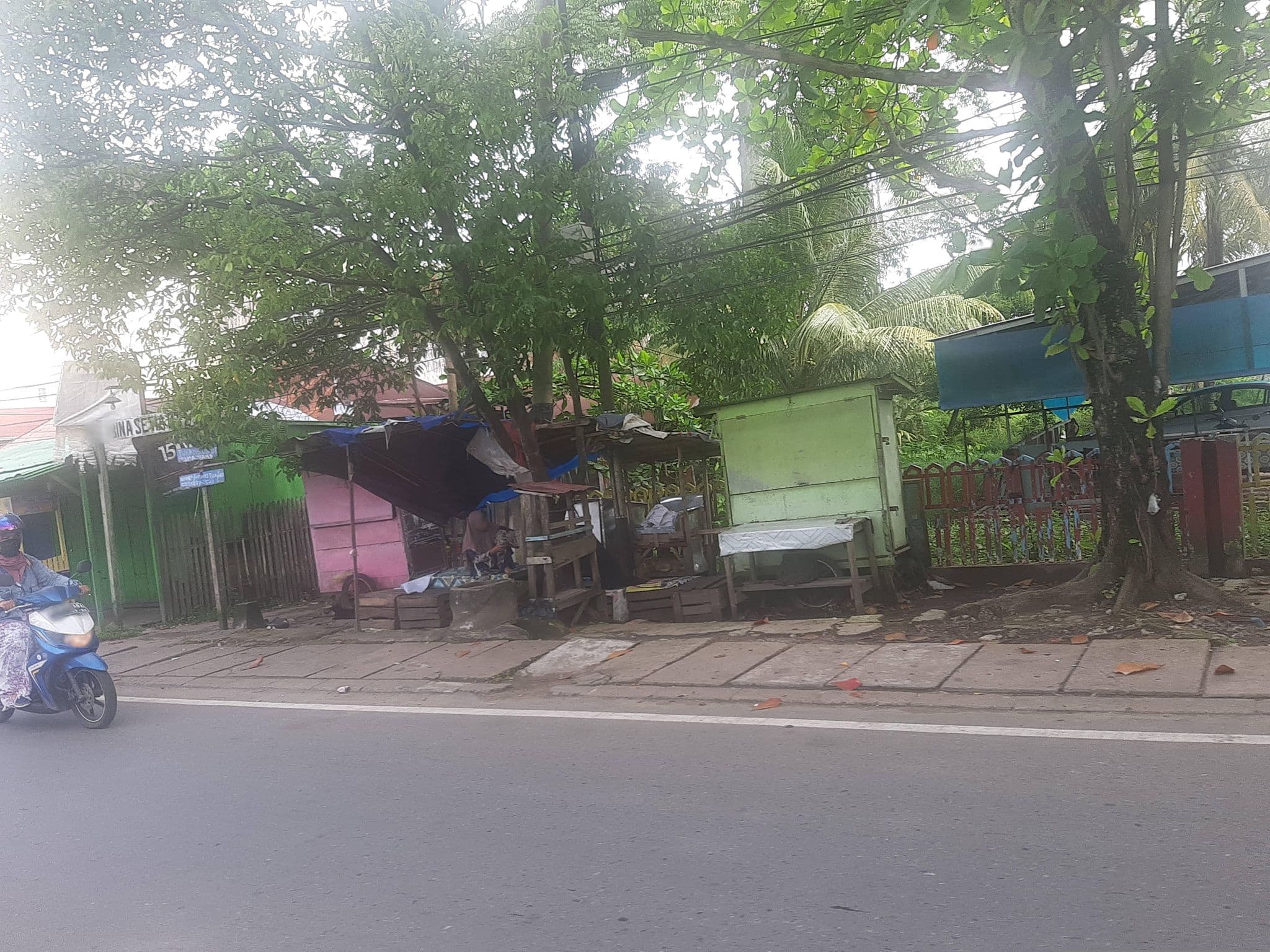 Street view near Grand tropix suite hotel, Banjarmasin — © FenyMufyd (CC BY-SA · Mapillary)