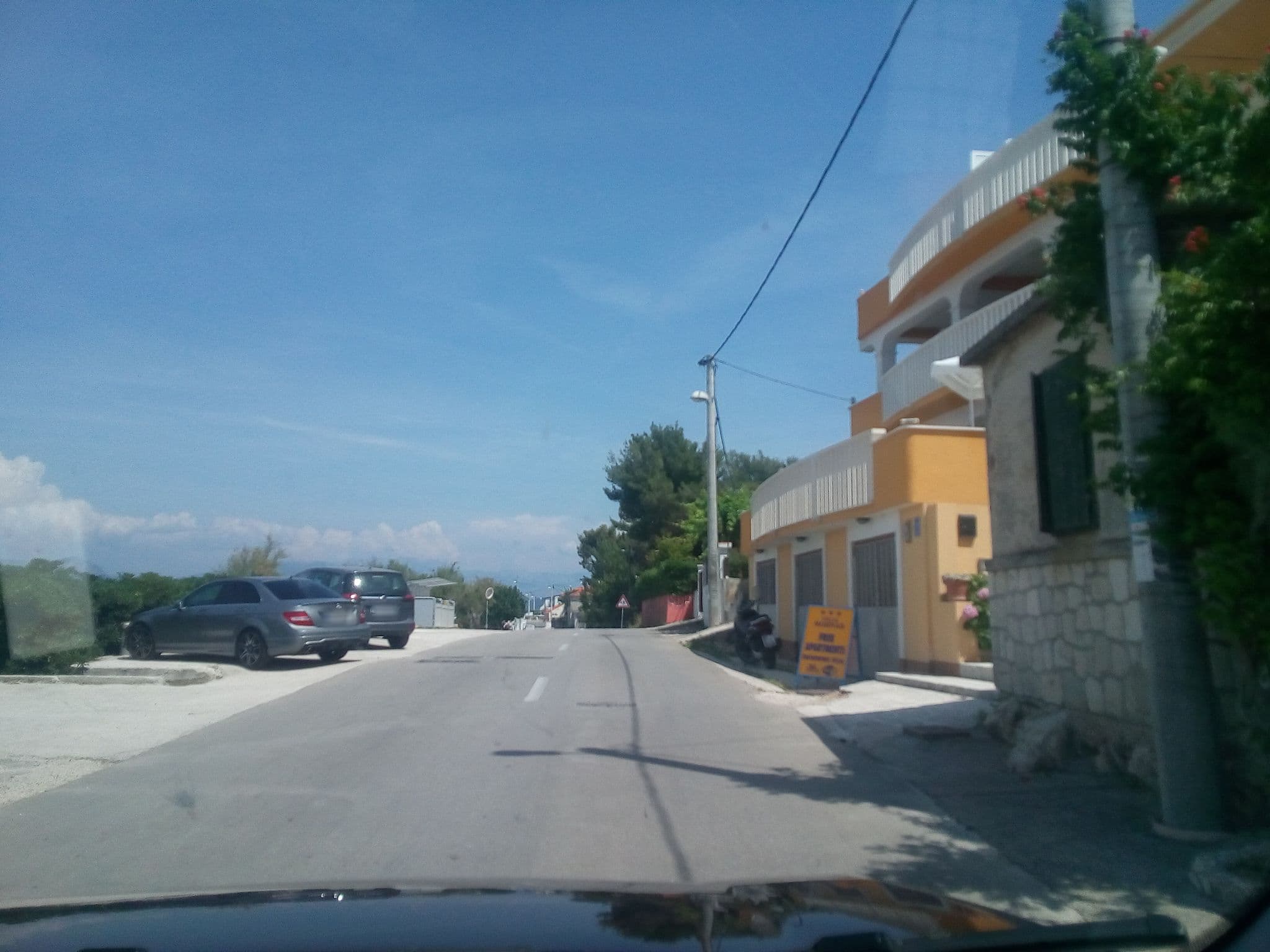 Street view near Apartments Angela, Okrug Gornji — © karthoo (CC BY-SA · Mapillary)