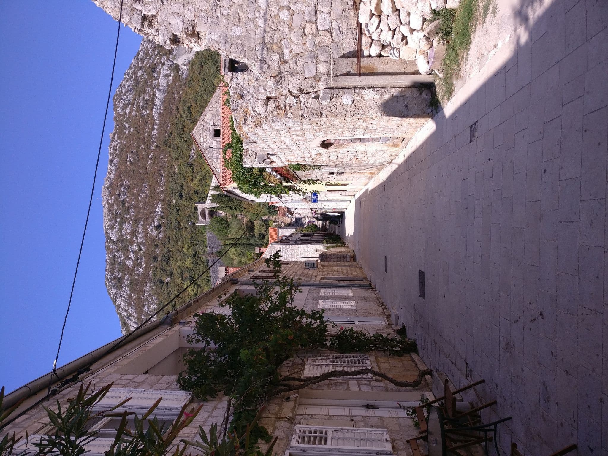 Street view near Apartment Main Street, Opuzen — © ax3l (CC BY-SA · Mapillary)