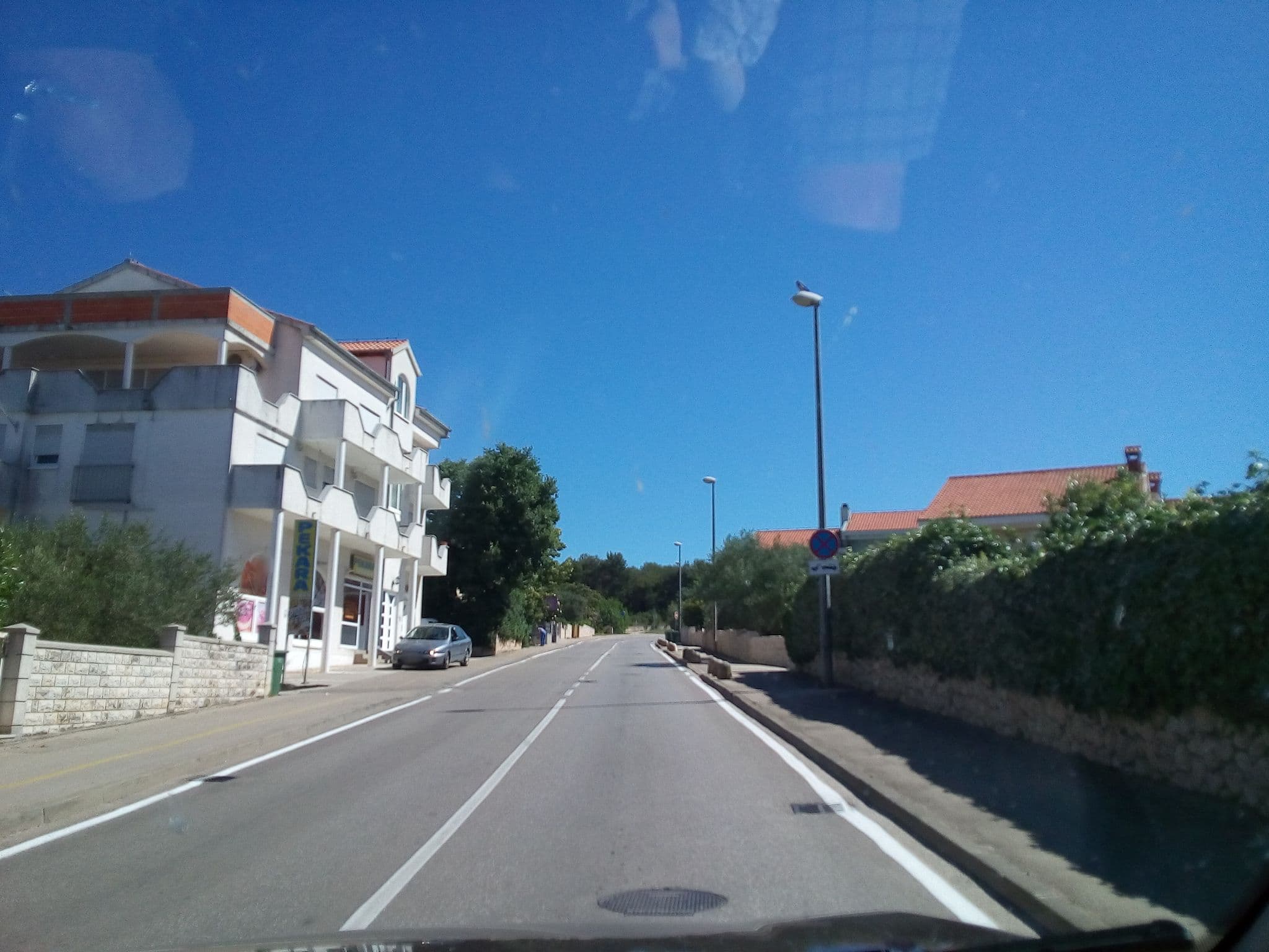Street view near ZAJEDNIČKI UGOSTITELJSKI OBRT MEDITERAN, suvl. ROBERT ĆOZA i DANIJEL ĆOZA, Zadar — © karthoo (CC BY-SA · Mapillary)