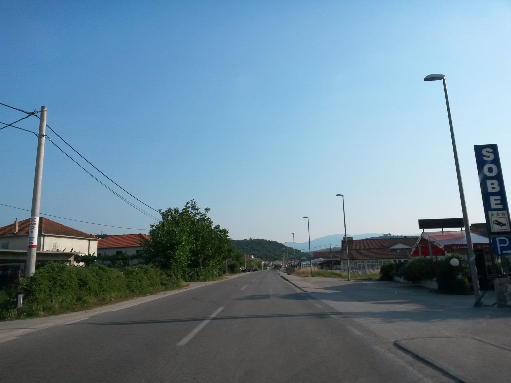 Street view near Restaurant and rooms "Dalmacija" Trilj, Trilj — © osmapper (CC BY-SA · Mapillary)