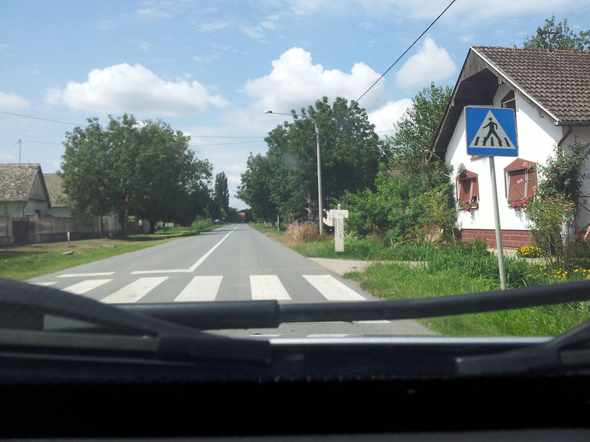 Street view near VACO d.o.o., Bilje — © osmapper (CC BY-SA · Mapillary)