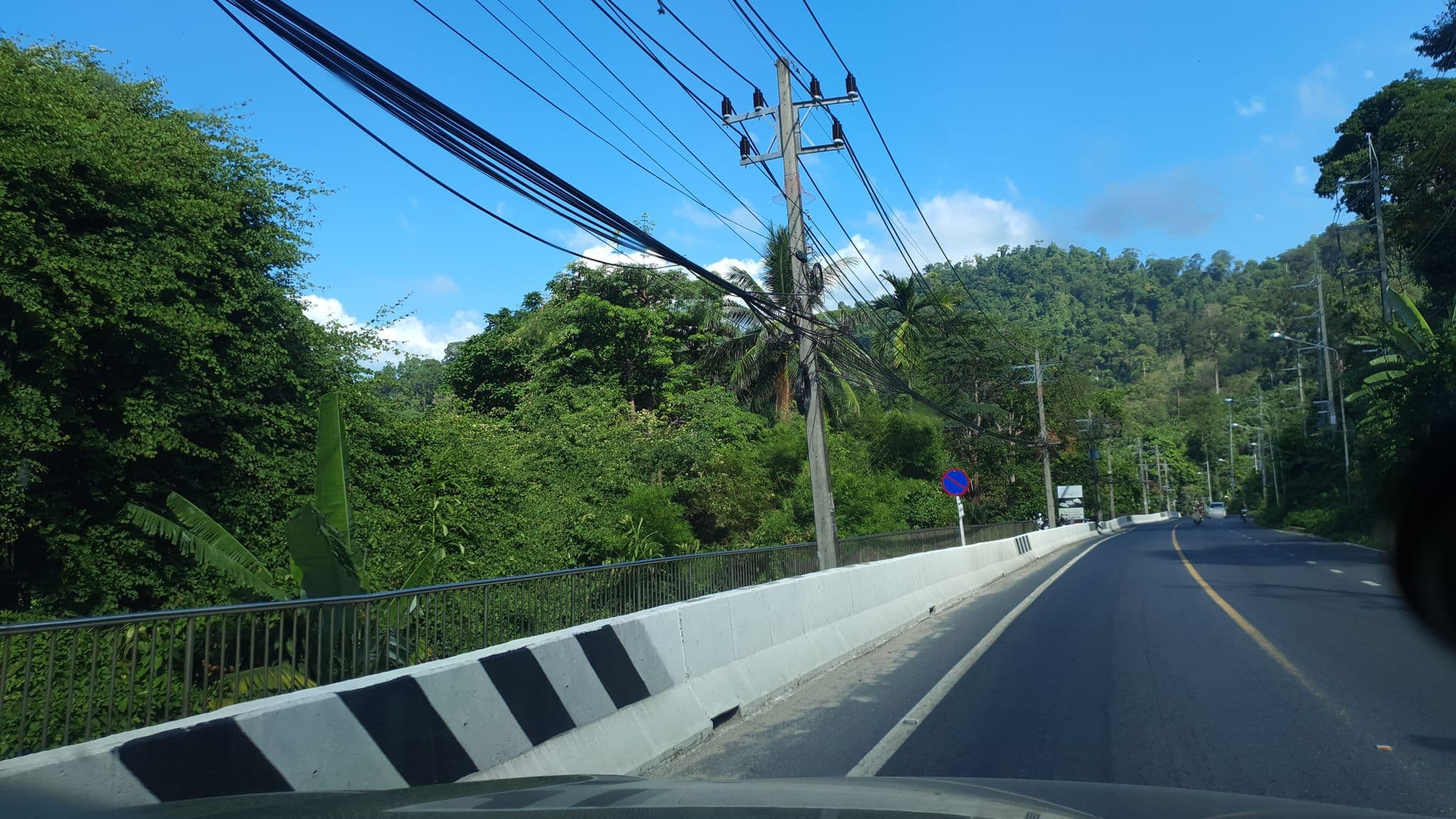 Street view near บ้านกระทิงรีสอร์ท, Ban Khao Lak — © jrcarlsen (CC BY-SA · Mapillary)