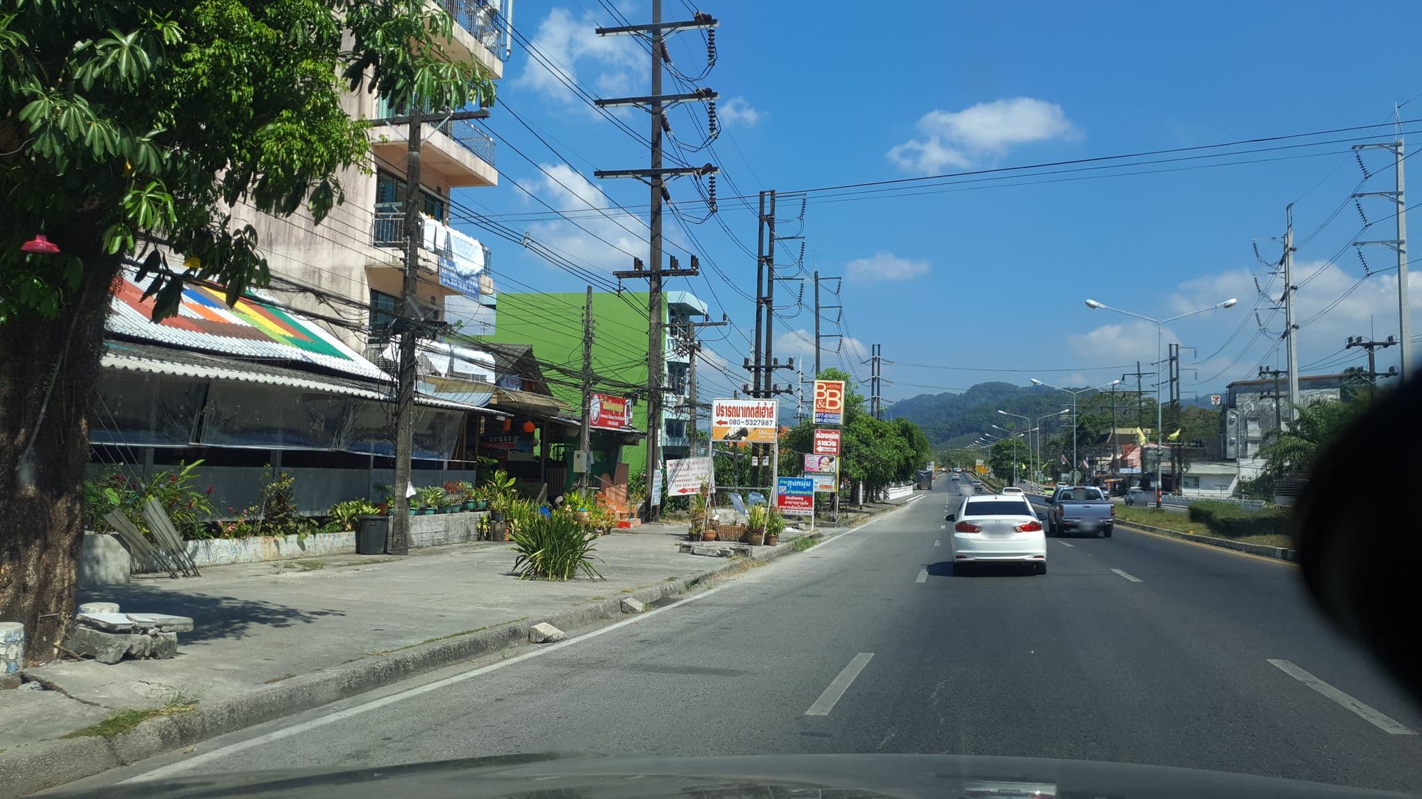 Street view near โรงแรมจันทร์สม (ถ.เพชรเกษม), Ranong — © jrcarlsen (CC BY-SA · Mapillary)