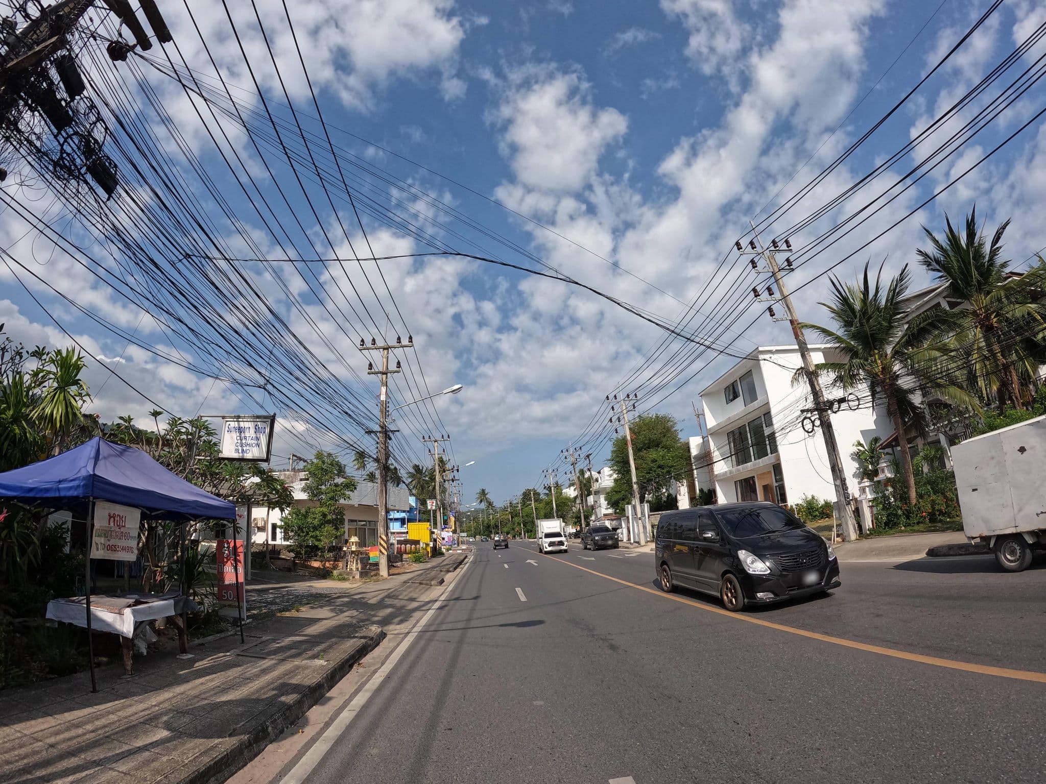 Street view near Holiday Hotel, Ko Samui — © lucomsky (CC BY-SA · Mapillary)