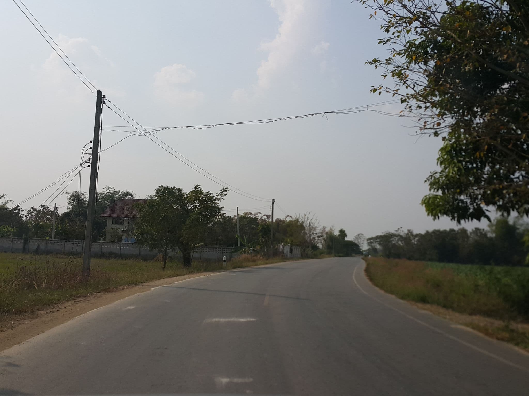 Street view near Huanmaisakngam Resort, San Kamphaeng — © jrcarlsen (CC BY-SA · Mapillary)