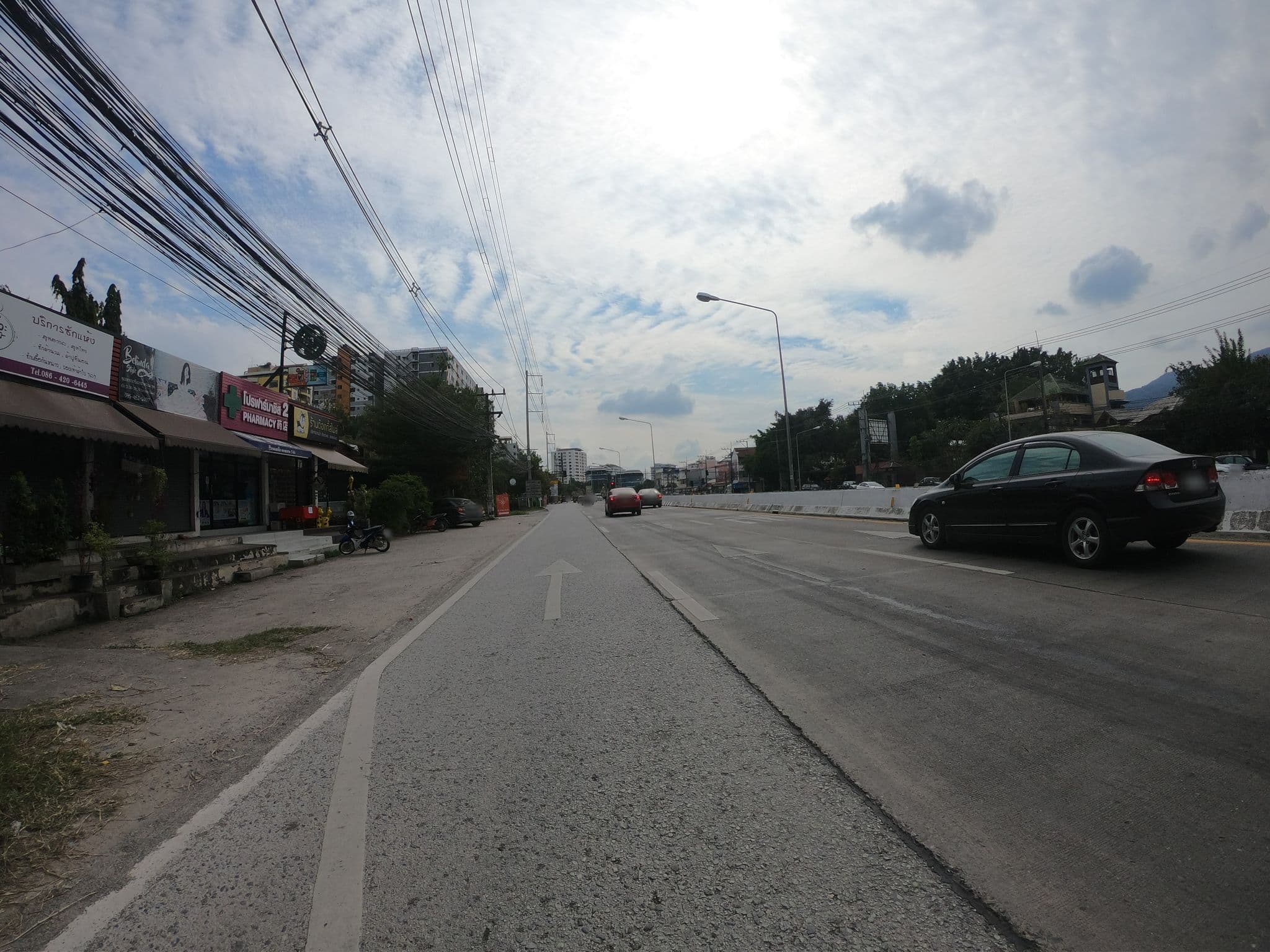 Street view near The SunTerrace, Chiang Mai — © chanuwath_grab (CC BY-SA · Mapillary)