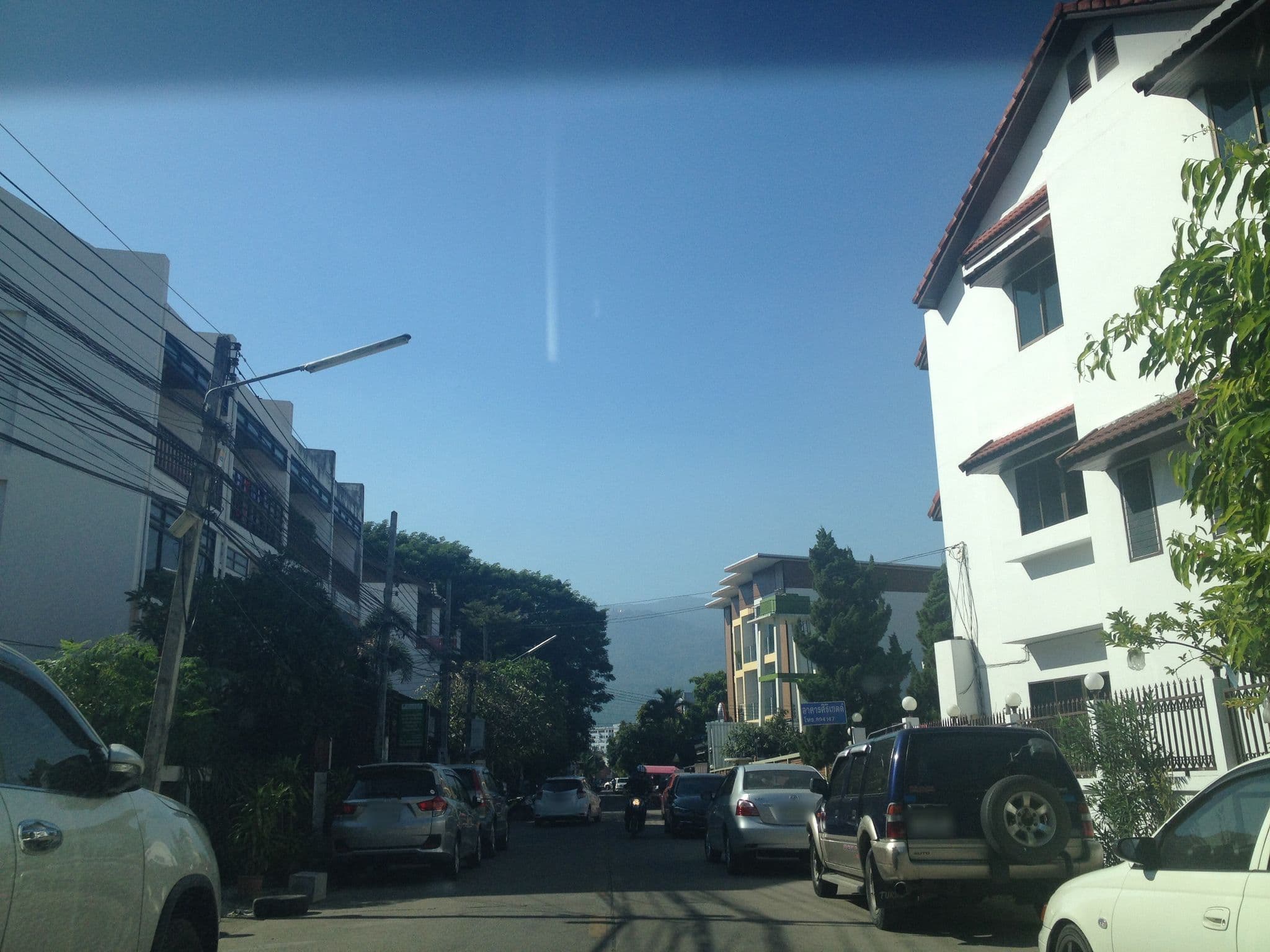 Street view near Bedford Nimman, Chiang Mai — © jimwatana (CC BY-SA · Mapillary)