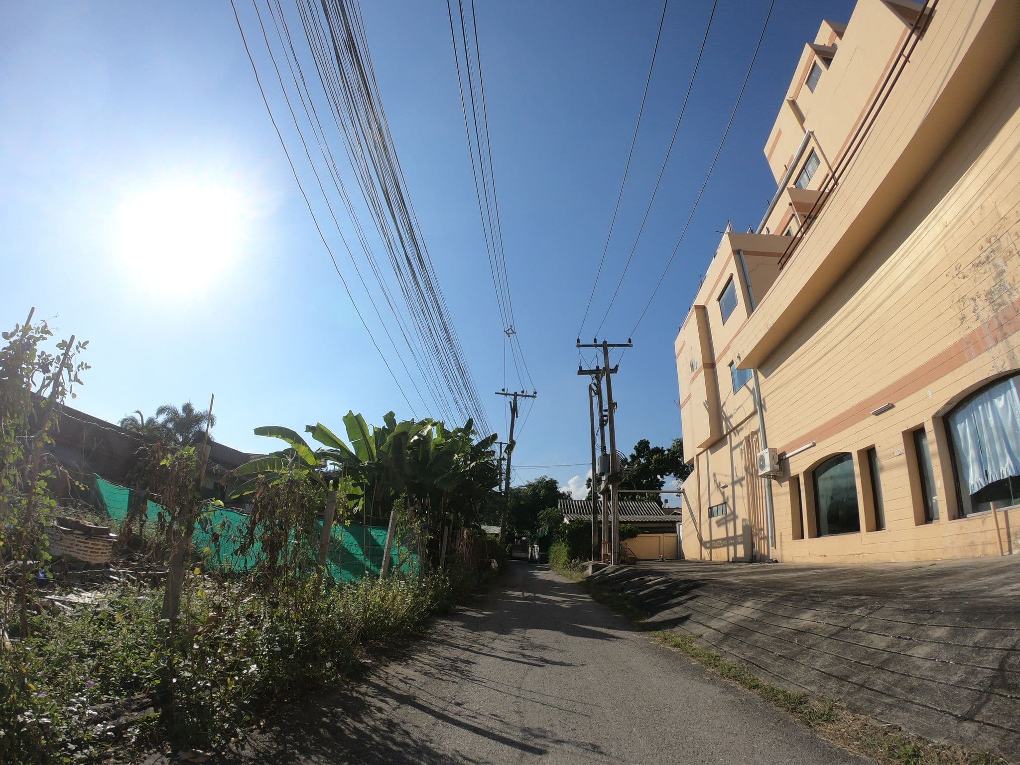 Street view near D-Town Wang  Inn| ดีทาวน์ วัง อิน, Chiang Mai — © chanuwath_grab (CC BY-SA · Mapillary)