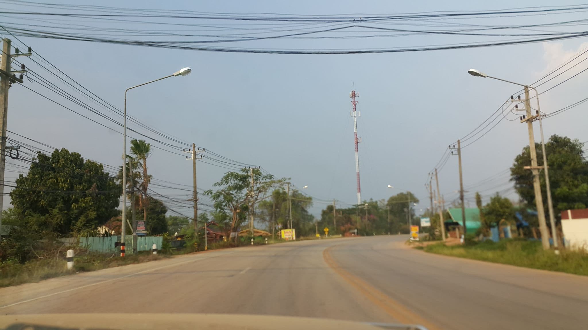 Street view near Thatphanom Resident ธาตุพนม เรสสิเดนท์, That Phanom — © jrcarlsen (CC BY-SA · Mapillary)