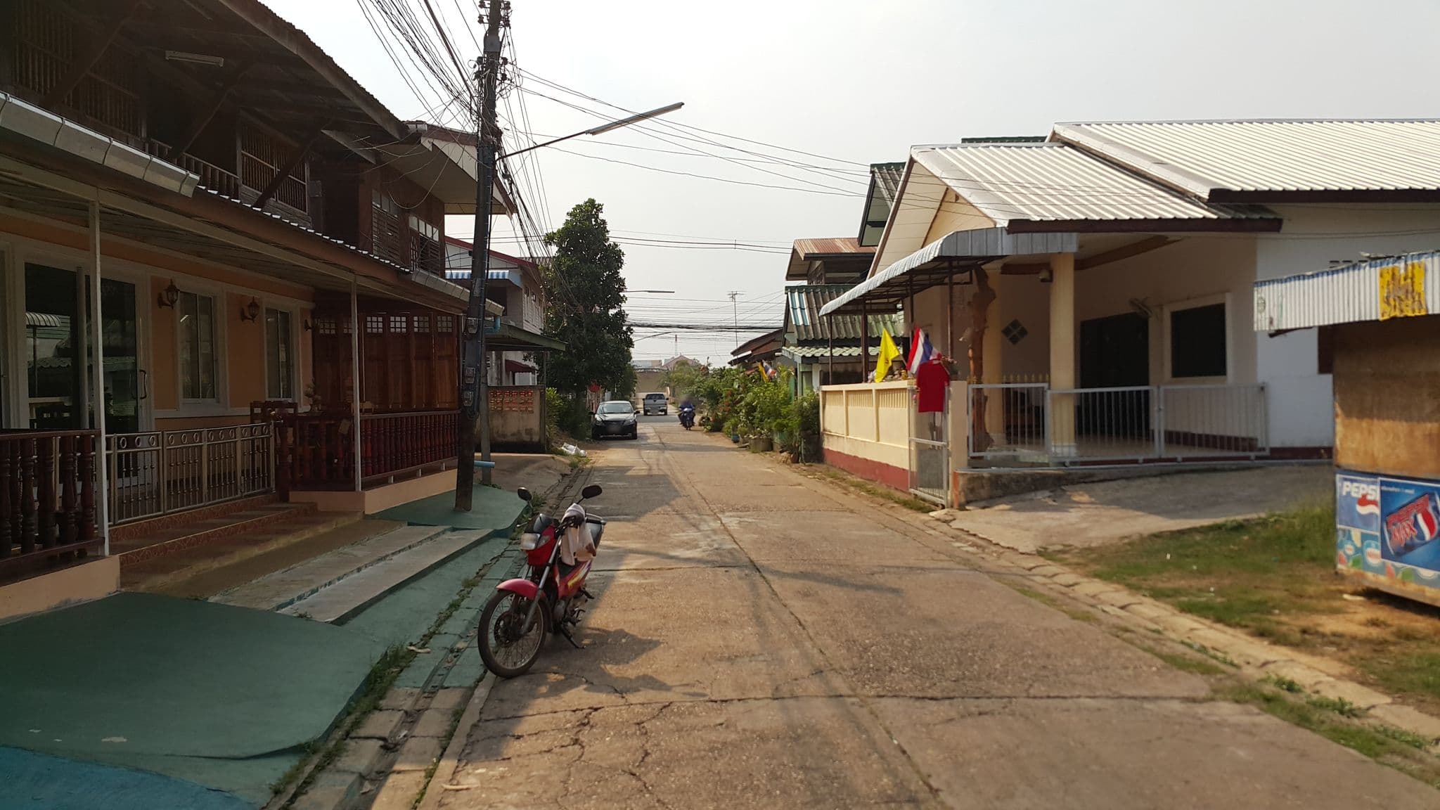 Street view near โอบอ้อมเฮ้าส์, That Phanom — © jrcarlsen (CC BY-SA · Mapillary)