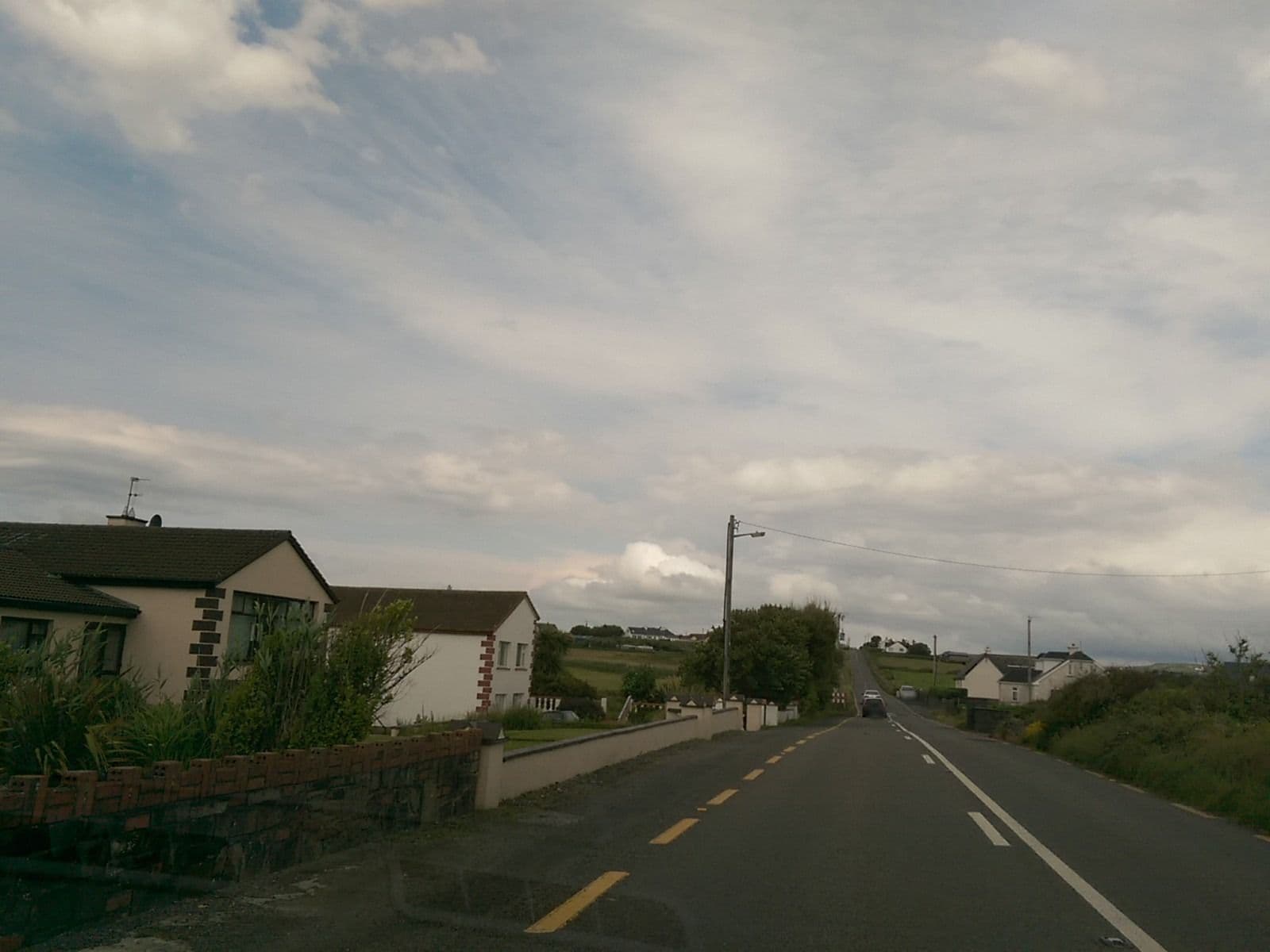Street view near Sea Crest Farmhouse, Ennistimon — © dacor (CC BY-SA · Mapillary)