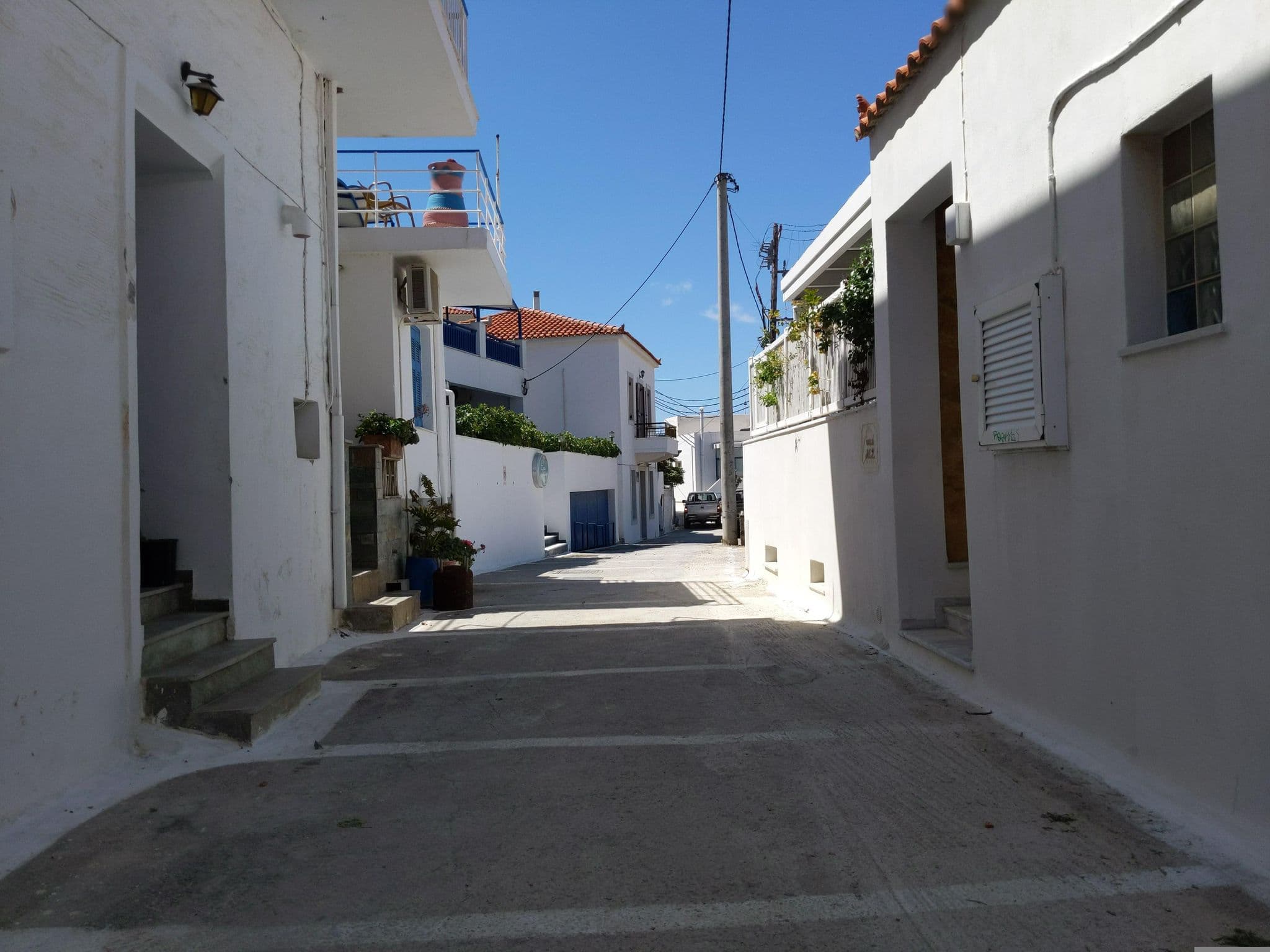 Street view near Erato Apartments, Batsíon — © drid (CC BY-SA · Mapillary)
