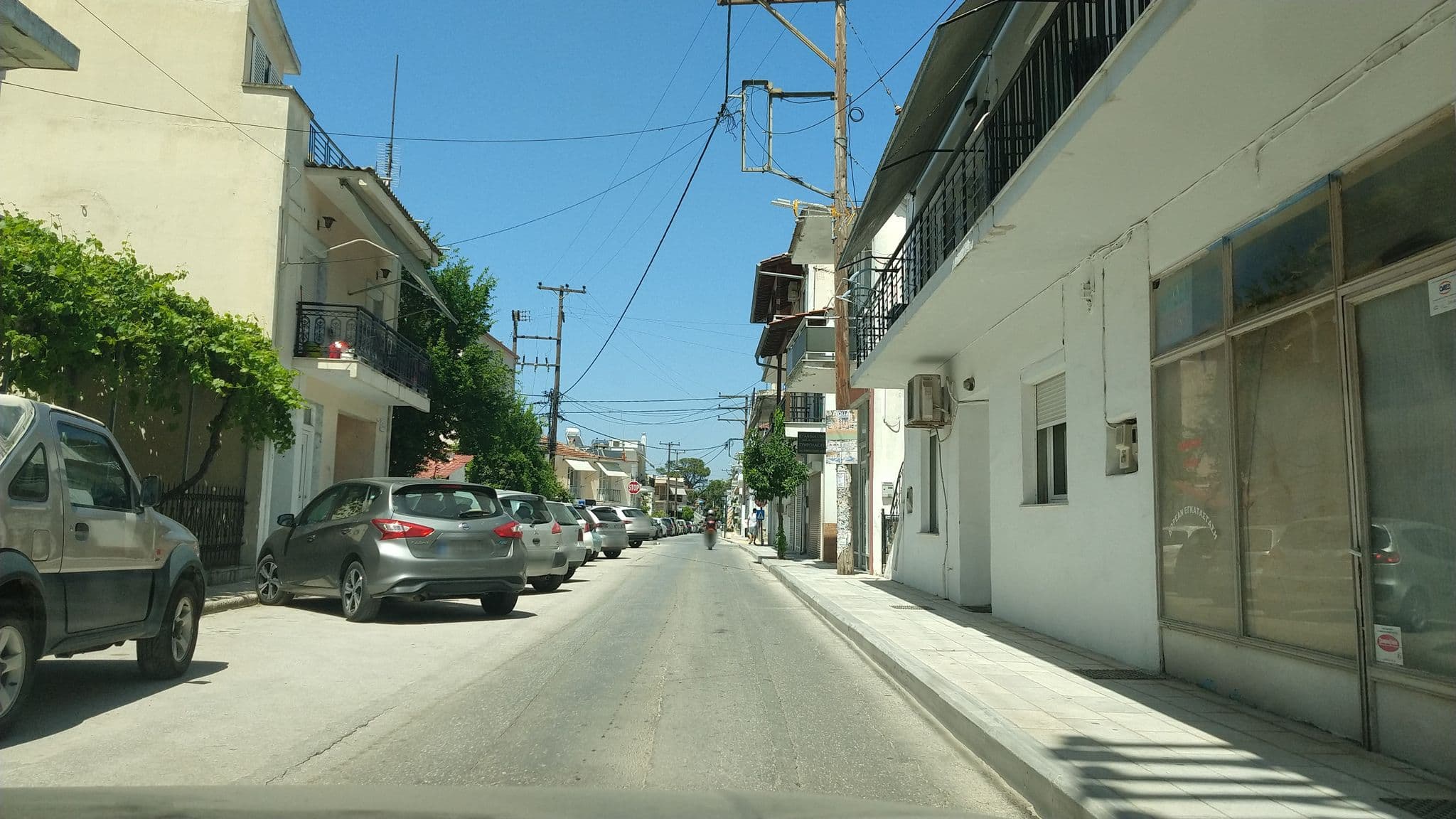 Street view near Diamanti Apartments Downtown Limenas, Thásos — © lucia_ (CC BY-SA · Mapillary)