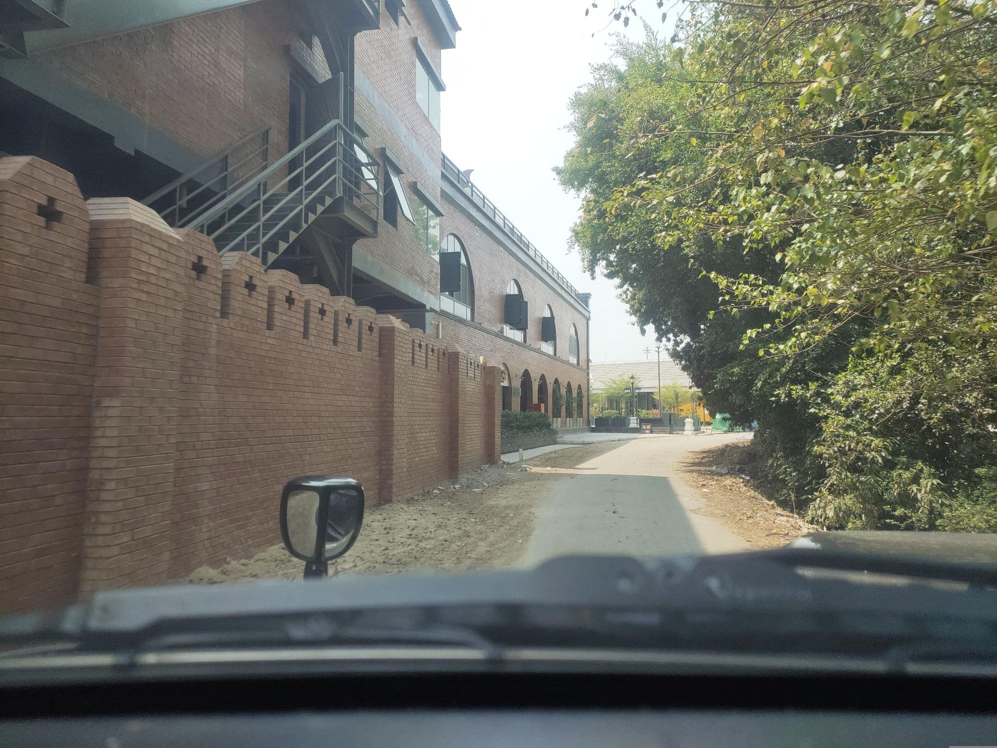 Street view near Chinlone Hostel, Amarapura — © happysmile (CC BY-SA · Mapillary)
