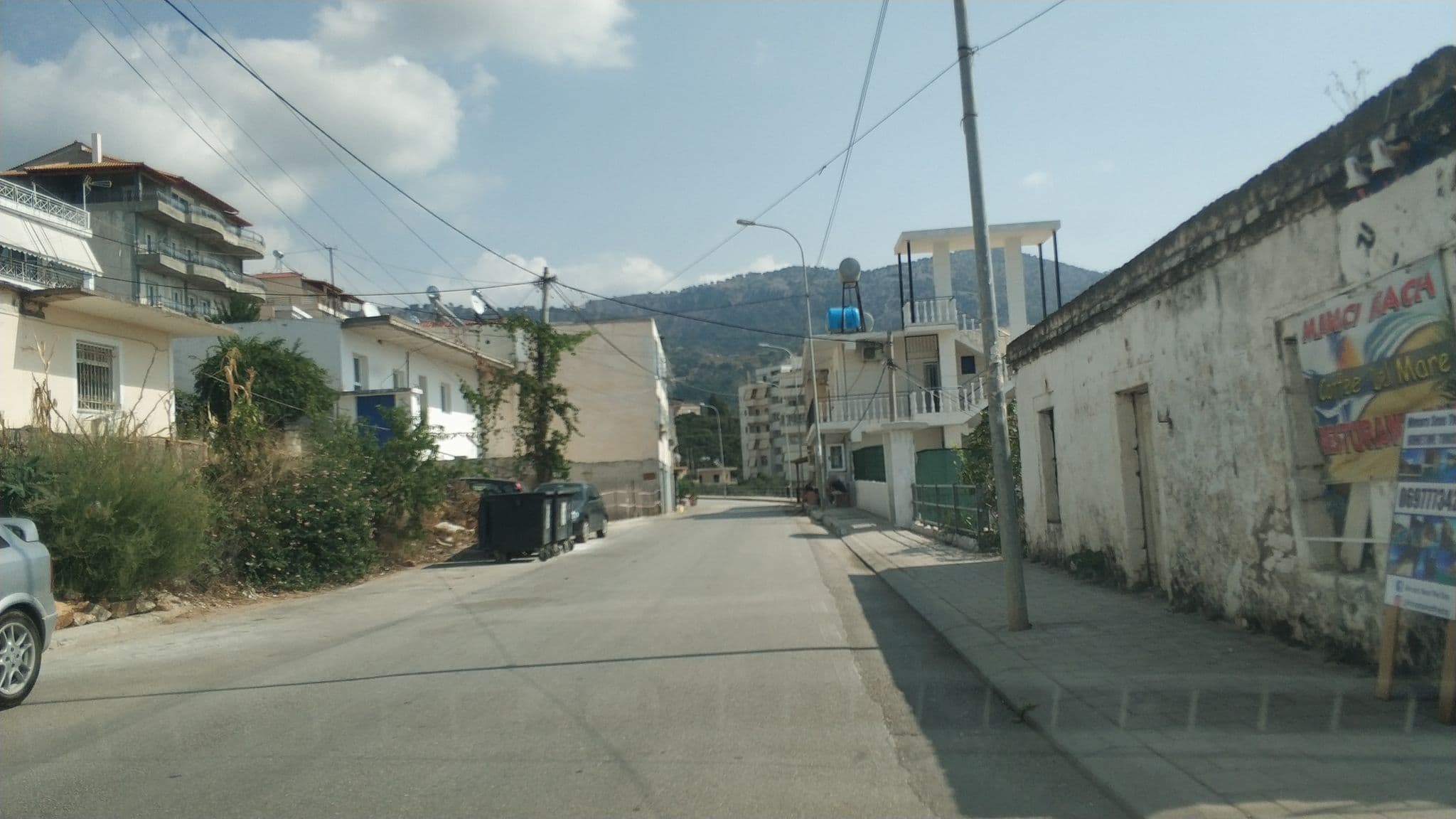 Street view near sofia's cozy rooms, Himarë — © freddouhelk (CC BY-SA · Mapillary)