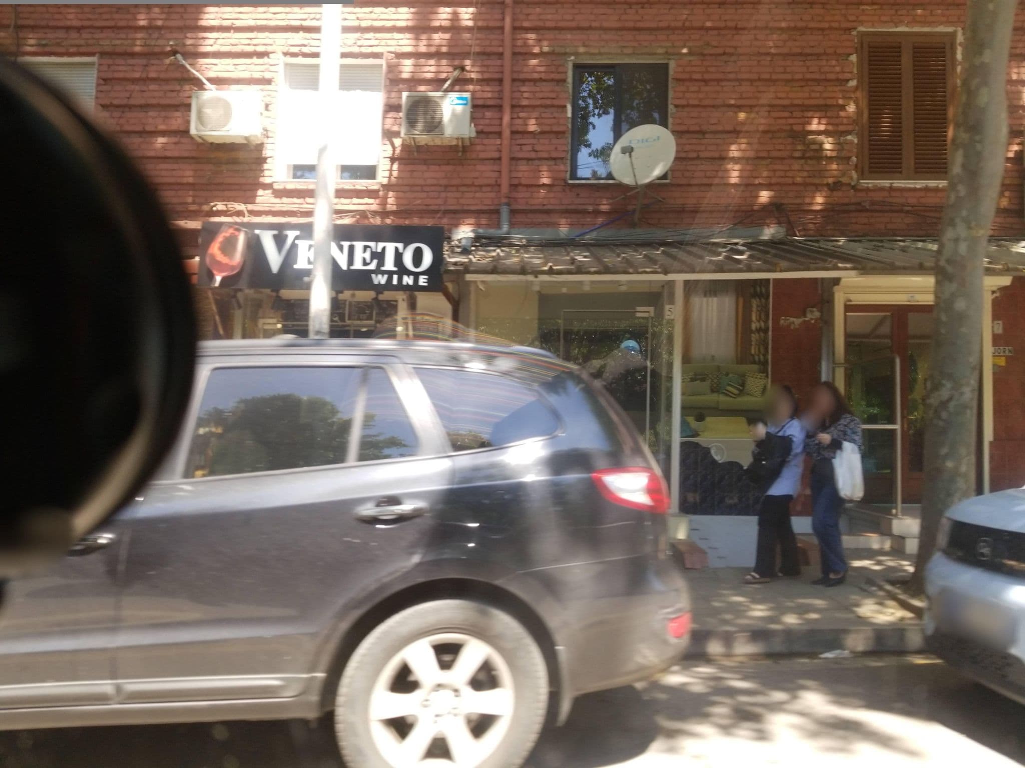Street view near Noon Central Hotel, Tirana — © denisju_osm (CC BY-SA · Mapillary)