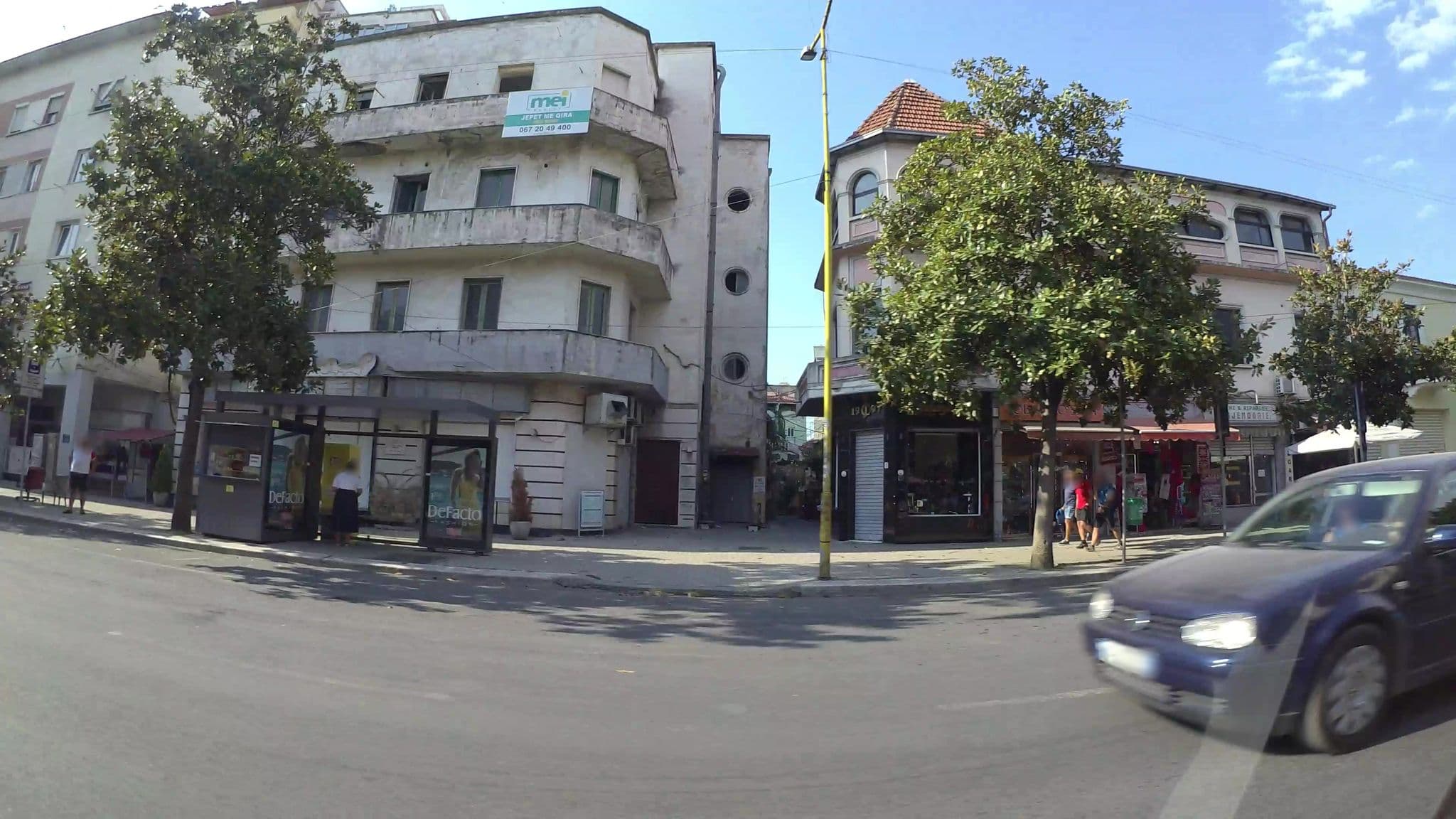 Street view near New Bazaar Hostel, Tirana — © kaart5 (CC BY-SA · Mapillary)