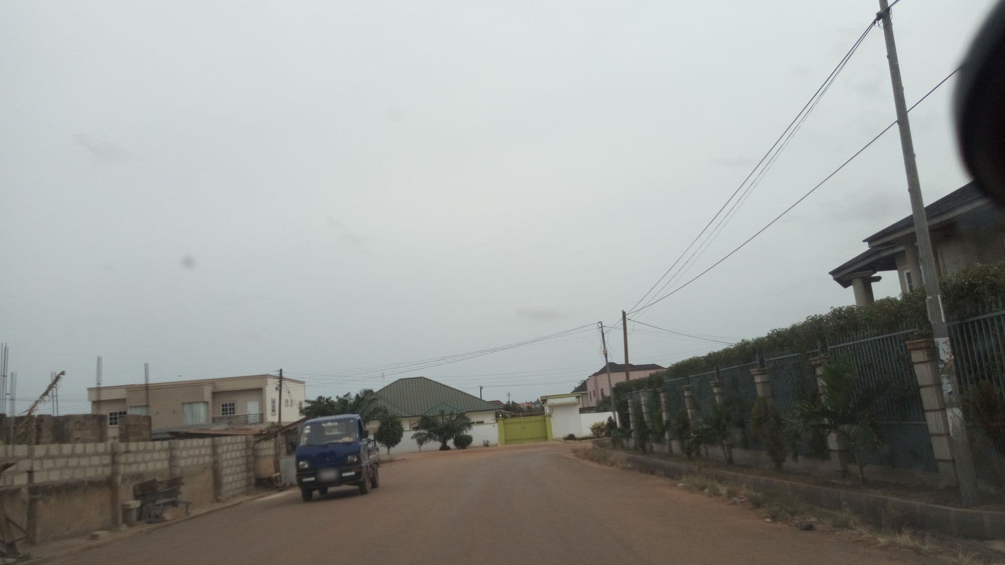 Street view near FOKUZZY LODGE, Medina Estates — © yaa2darko (CC BY-SA · Mapillary)