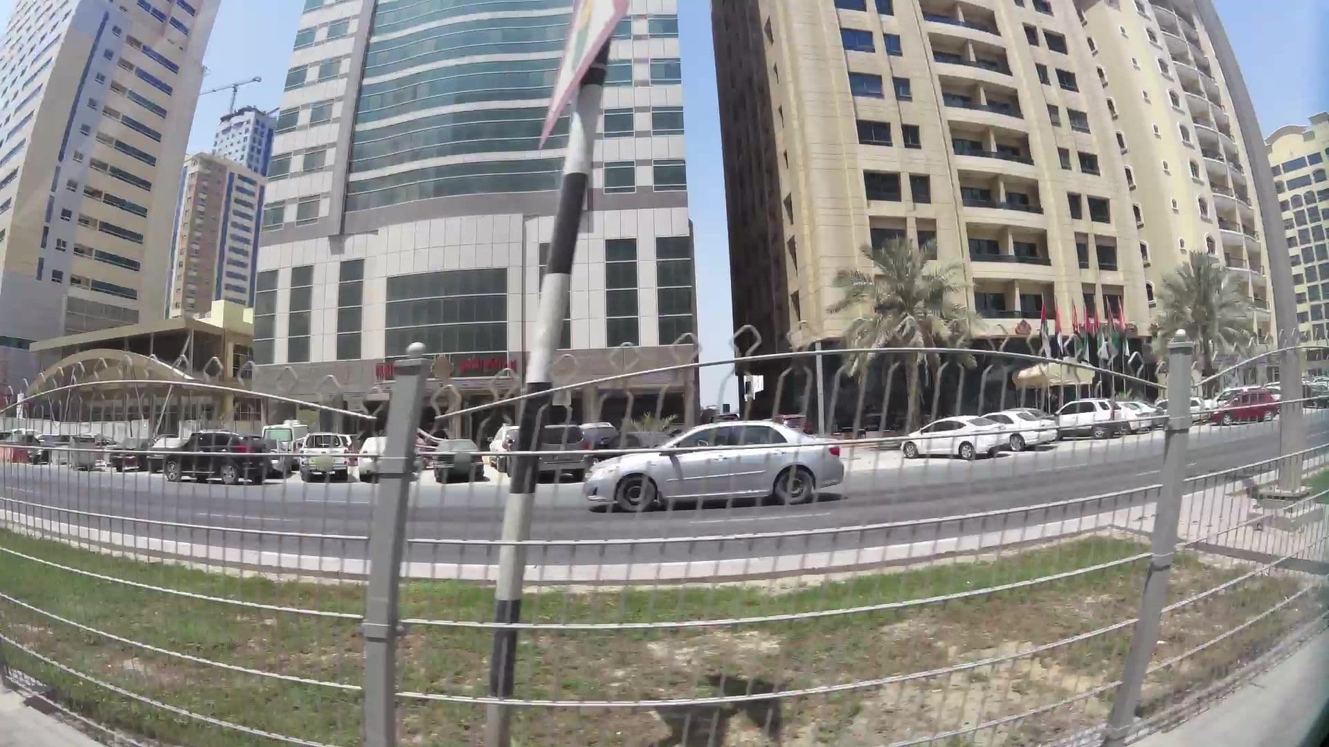 Street view near Golden Crown Tower, Al Majaz — © kaartcam (CC BY-SA · Mapillary)