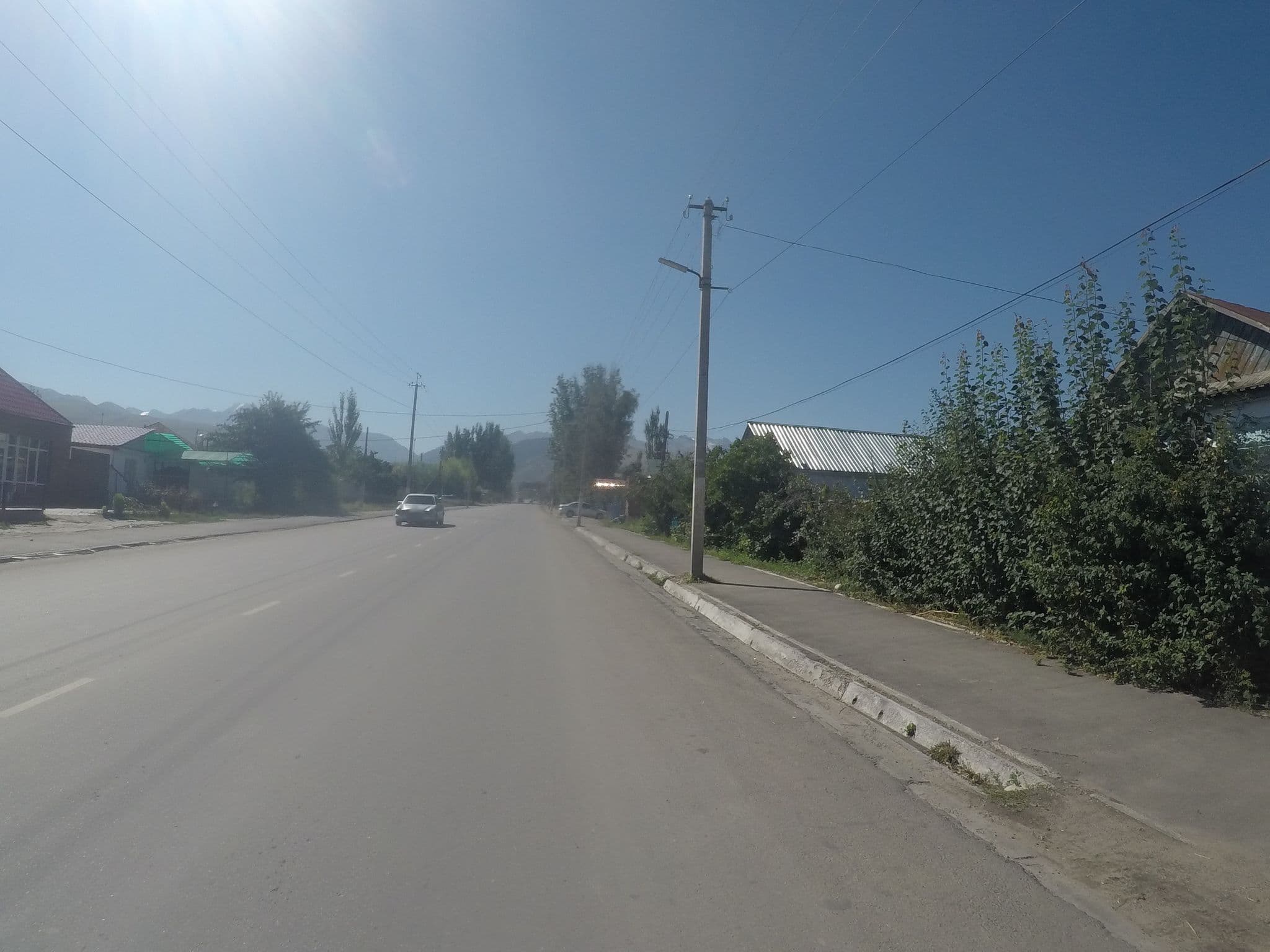 Street view near Kyrgyz House Hostel, Karakol — © chrisbeddow (CC BY-SA · Mapillary)