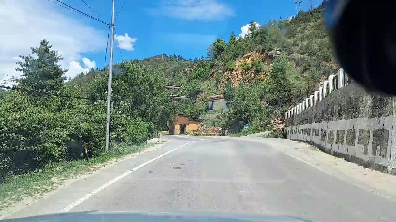 Street view near Hotel Silverpine - A Boutique Hotel in Thimpu, Thimphu — © roadroid (CC BY-SA · Mapillary)