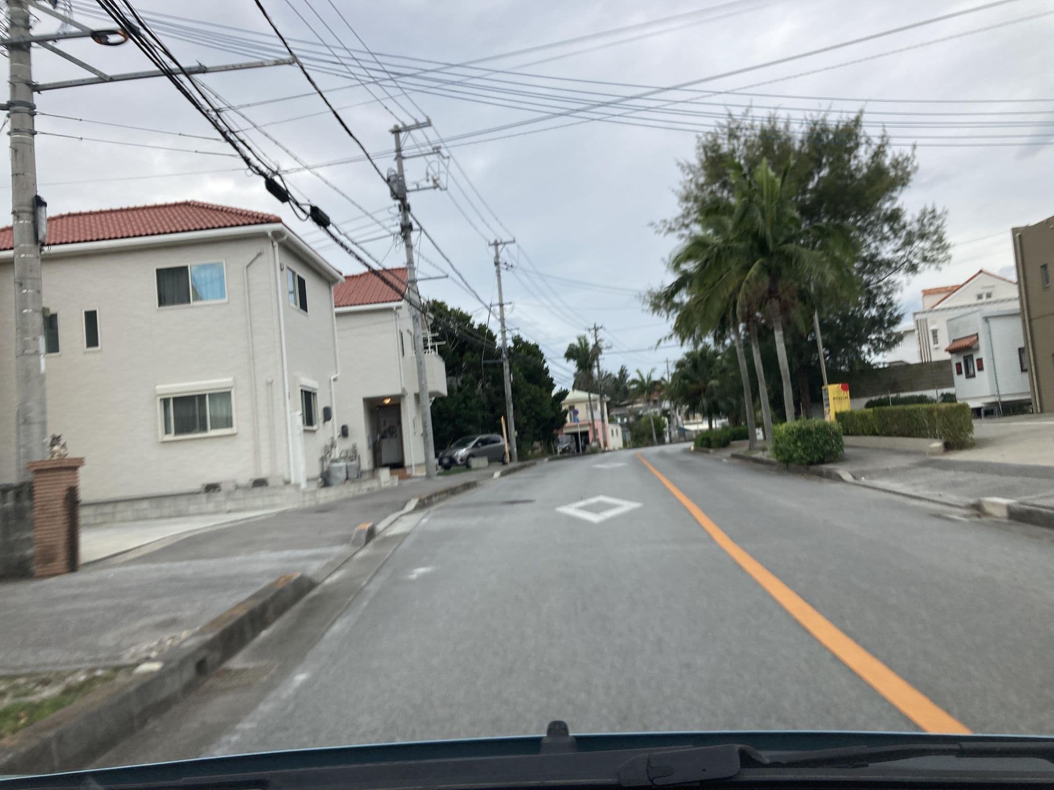 Street view near グランディオーソ沖縄ヴィラ恩納3（GRANDIOSO OKINAWA VILLA ONNA3）, Yomitan — © pika_sky (CC BY-SA · Mapillary)