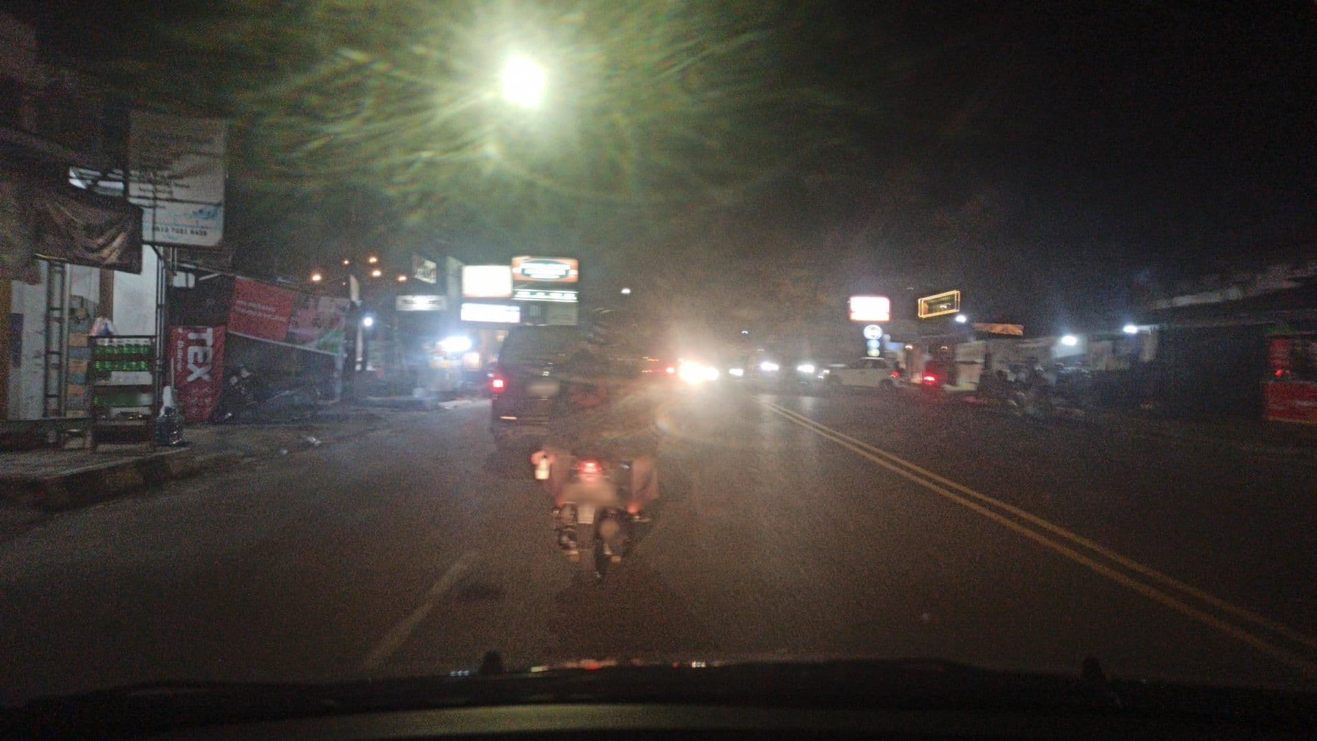 Street view near Wisma Hulubalang, Palembang — © roadroid (CC BY-SA · Mapillary)