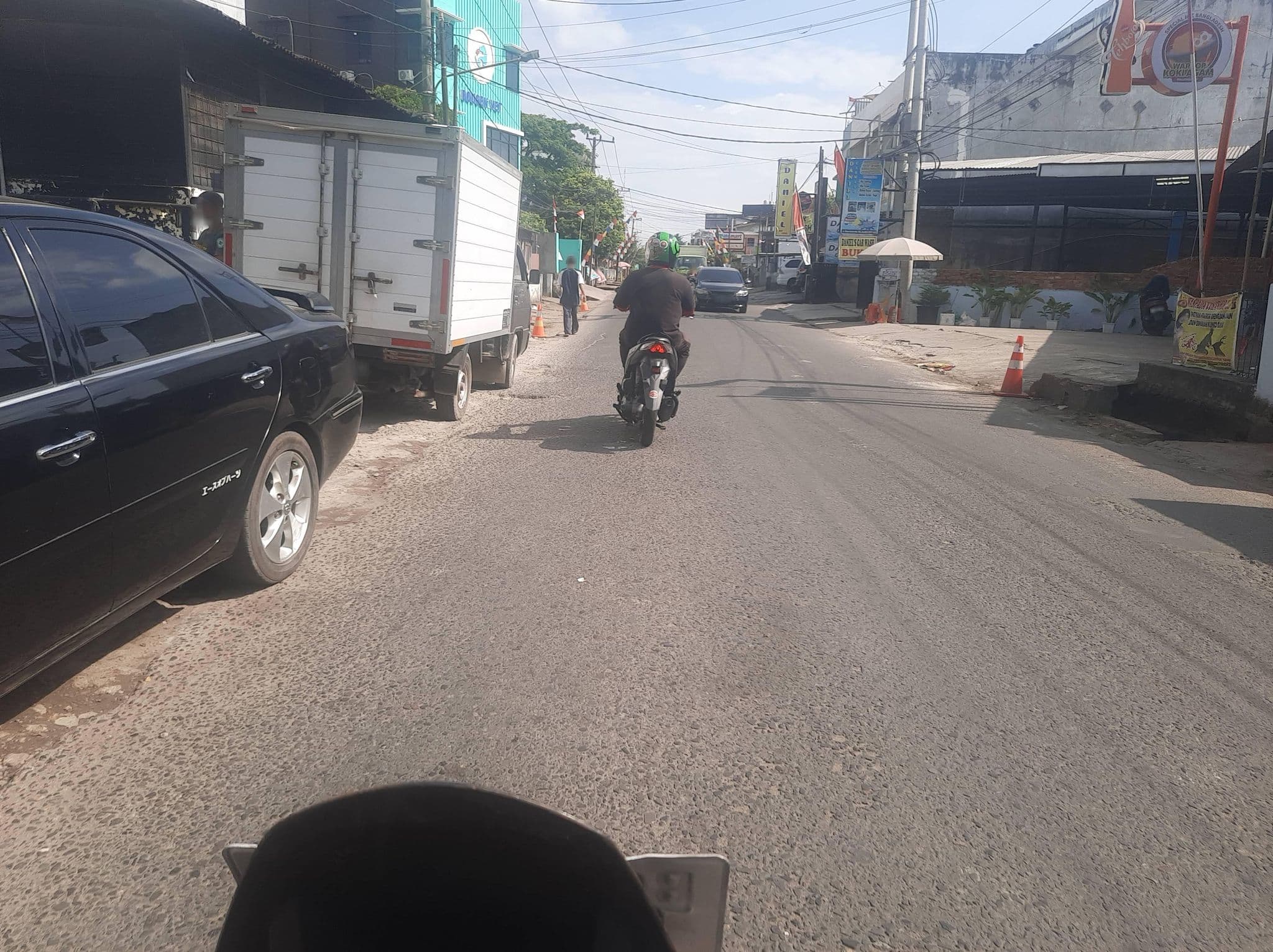 Street view near Warkop Loki Agam, Palembang — © Kaart_Local (CC BY-SA · Mapillary)