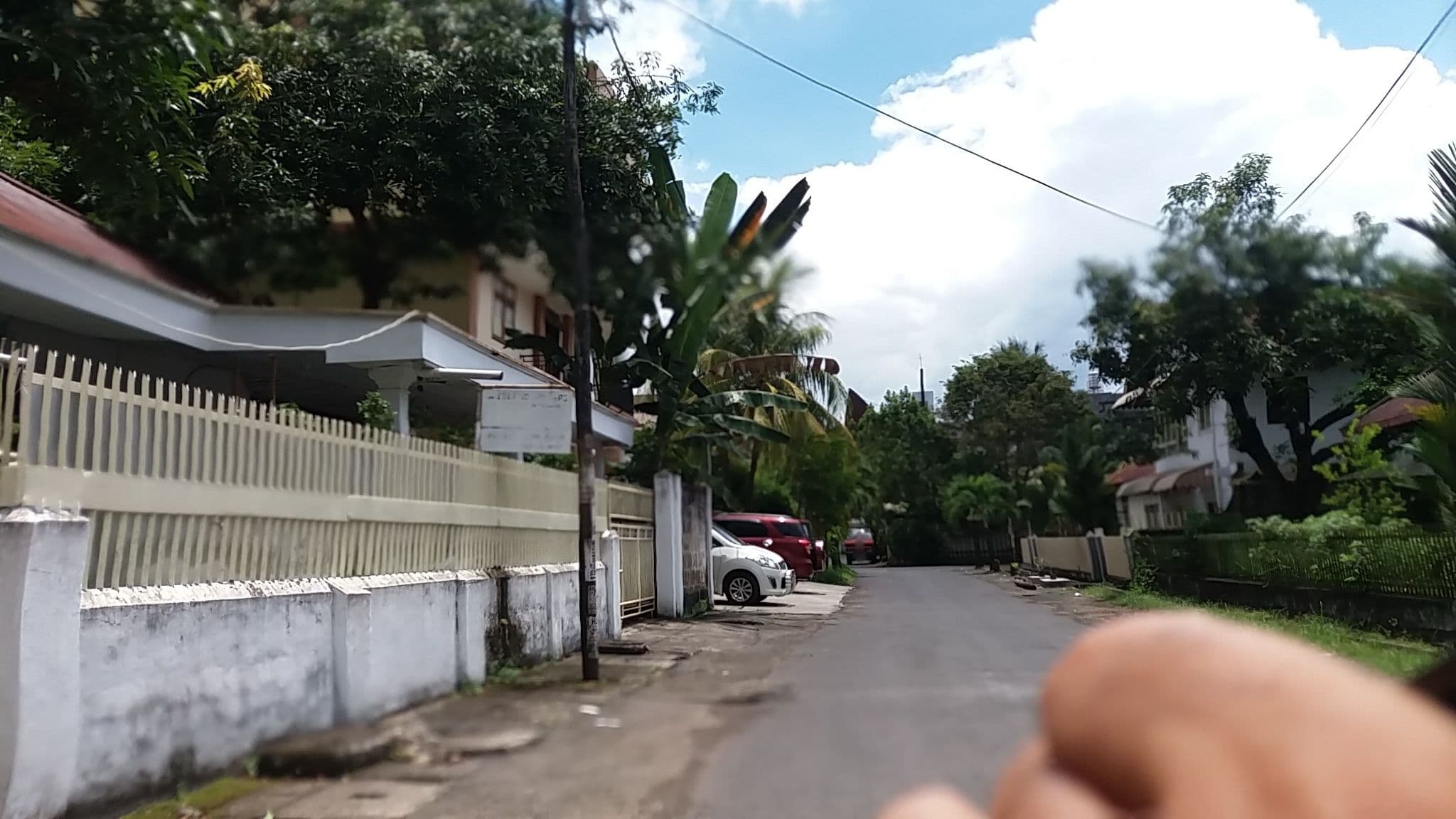 Street view near White House, Manado — © roadroid (CC BY-SA · Mapillary)