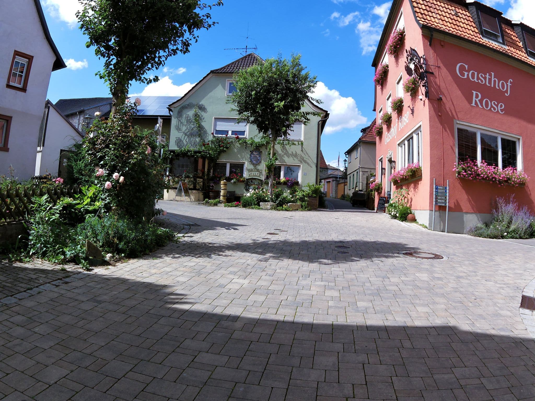 Street view near Gasthaus & Hotel Zur Rose, Wipfeld — © zoegglmeyr (CC BY-SA · Mapillary)