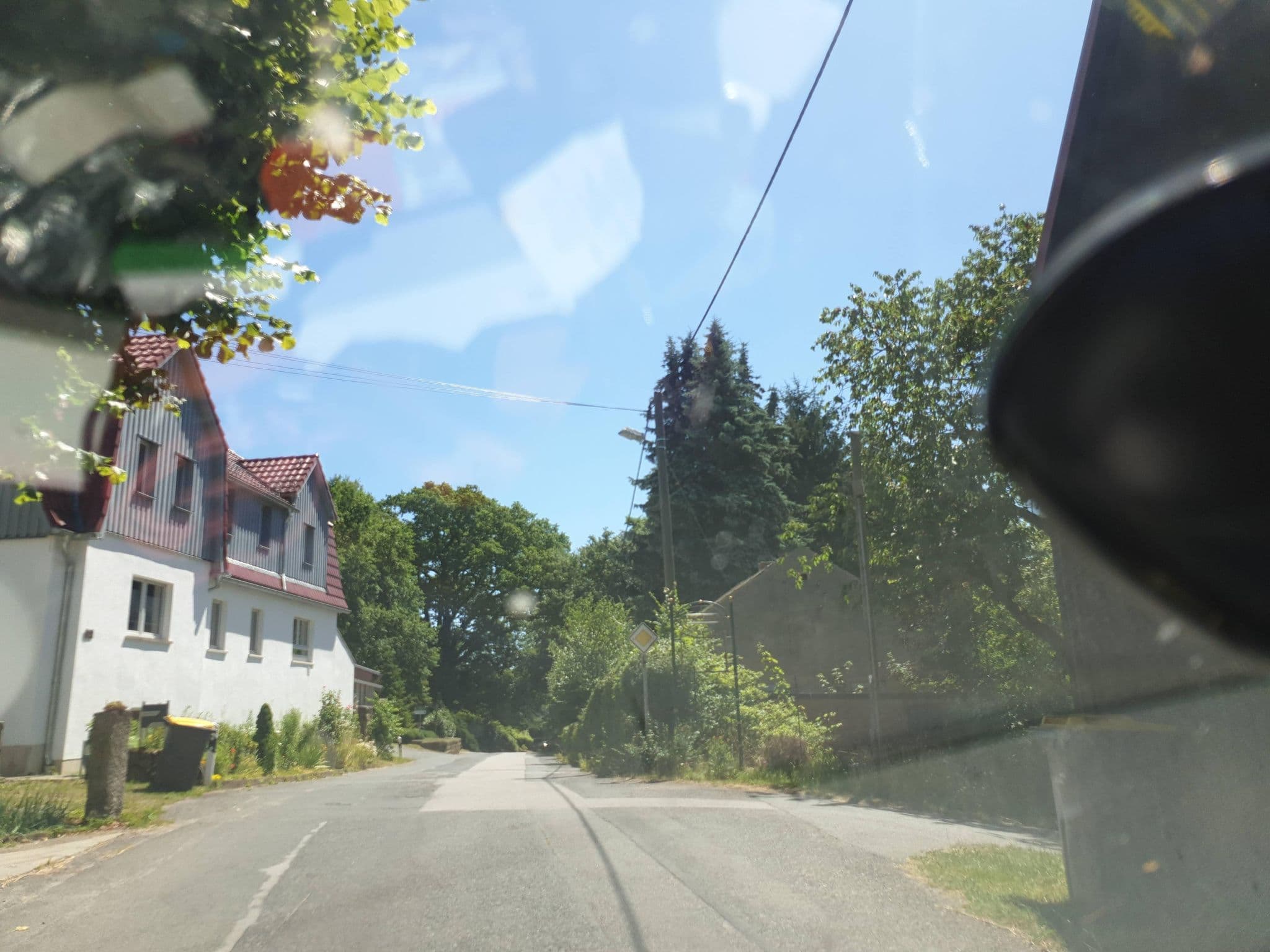 Street view near Pension Am Schloßpark, Struppen — © canislupus (CC BY-SA · Mapillary)