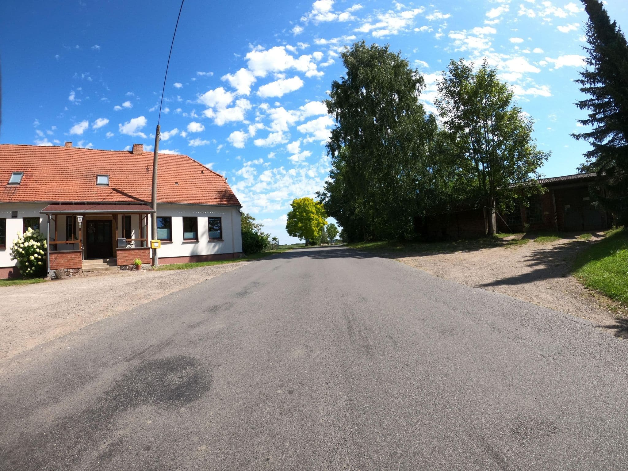 Street view near Cafe und Pension Kölln, Mühl Rosin — © masterofnoroad (CC BY-SA · Mapillary)