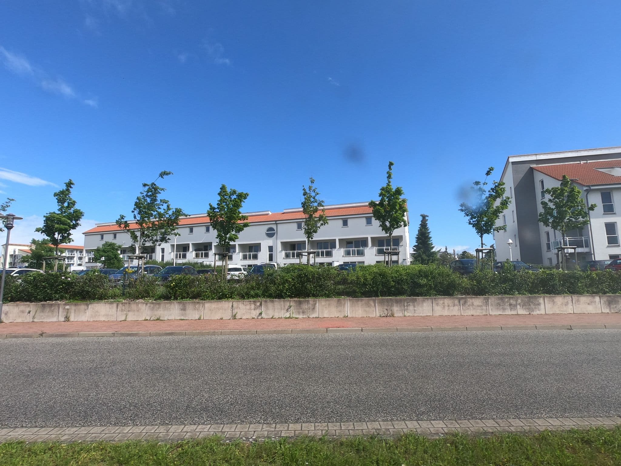 Street view near Aparthotel Yachthafenresidenz, Ostseebad Kühlungsborn — © carlheinz (CC BY-SA · Mapillary)