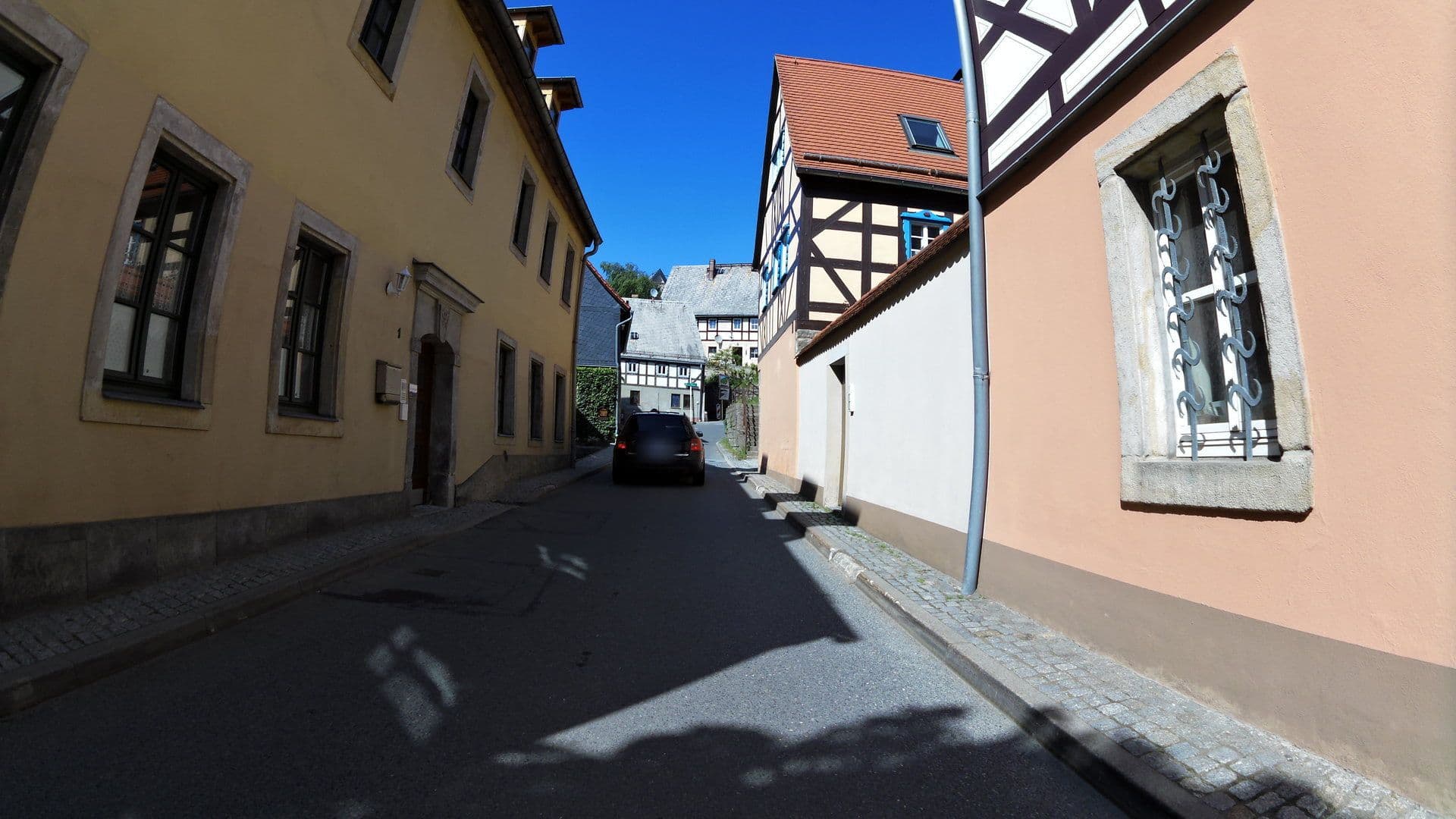Street view near Hotel & Restaurant Weißer Hirsch, Hohnstein — © moenk (CC BY-SA · Mapillary)