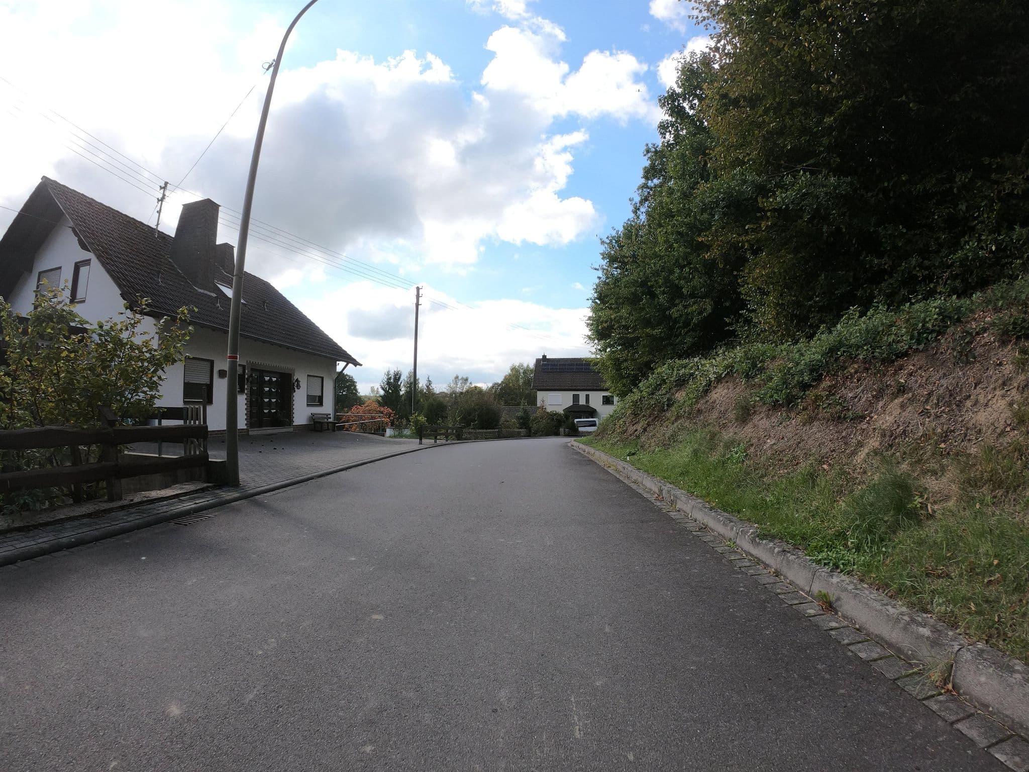 Street view near Ferienwohnungen Heisterholz, Weyerbusch — © bernd1960 (CC BY-SA · Mapillary)