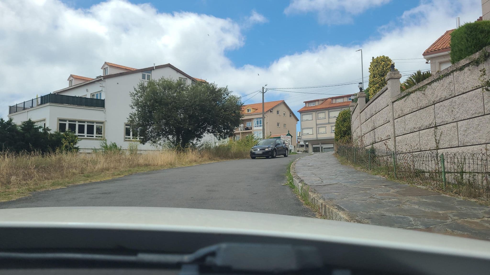 Street view near Área de Autocaravanas de San Roque, Fisterra — © juasmita (CC BY-SA · Mapillary)