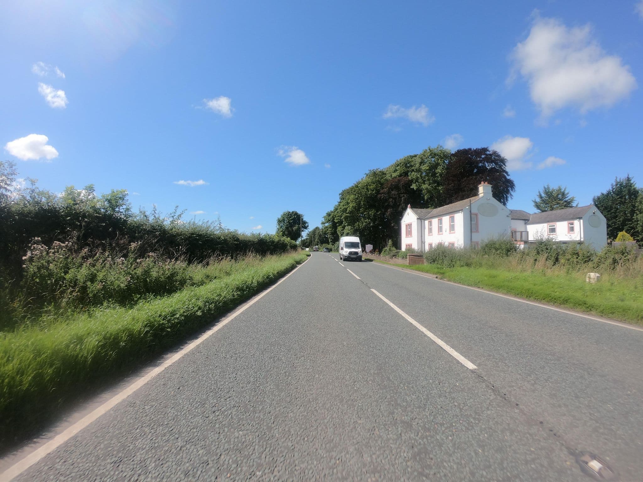 Street view near Big Pink House, Aspatria — © joostjakob (CC BY-SA · Mapillary)