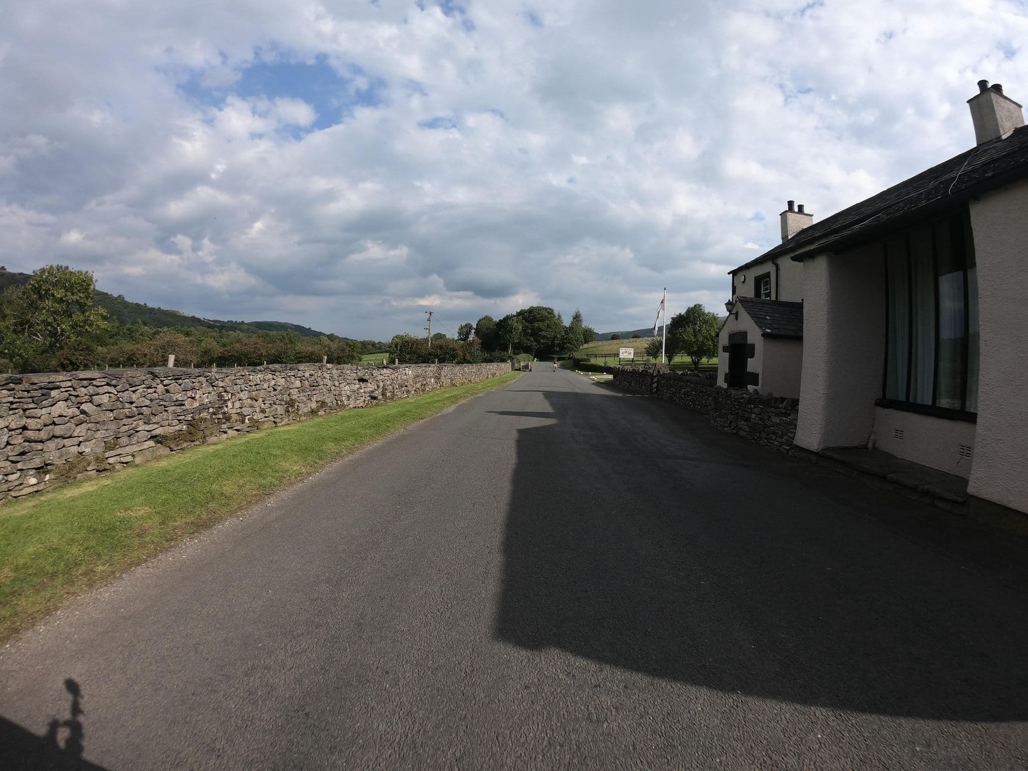Street view near New House Farm Country Guest House, Cockermouth — © joostjakob (CC BY-SA · Mapillary)