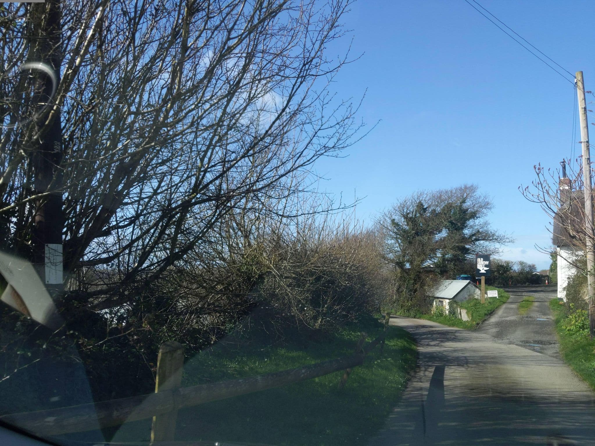 Street view near The Old Smithy Inn, Flexbury — © WaggyDog (CC BY-SA · Mapillary)