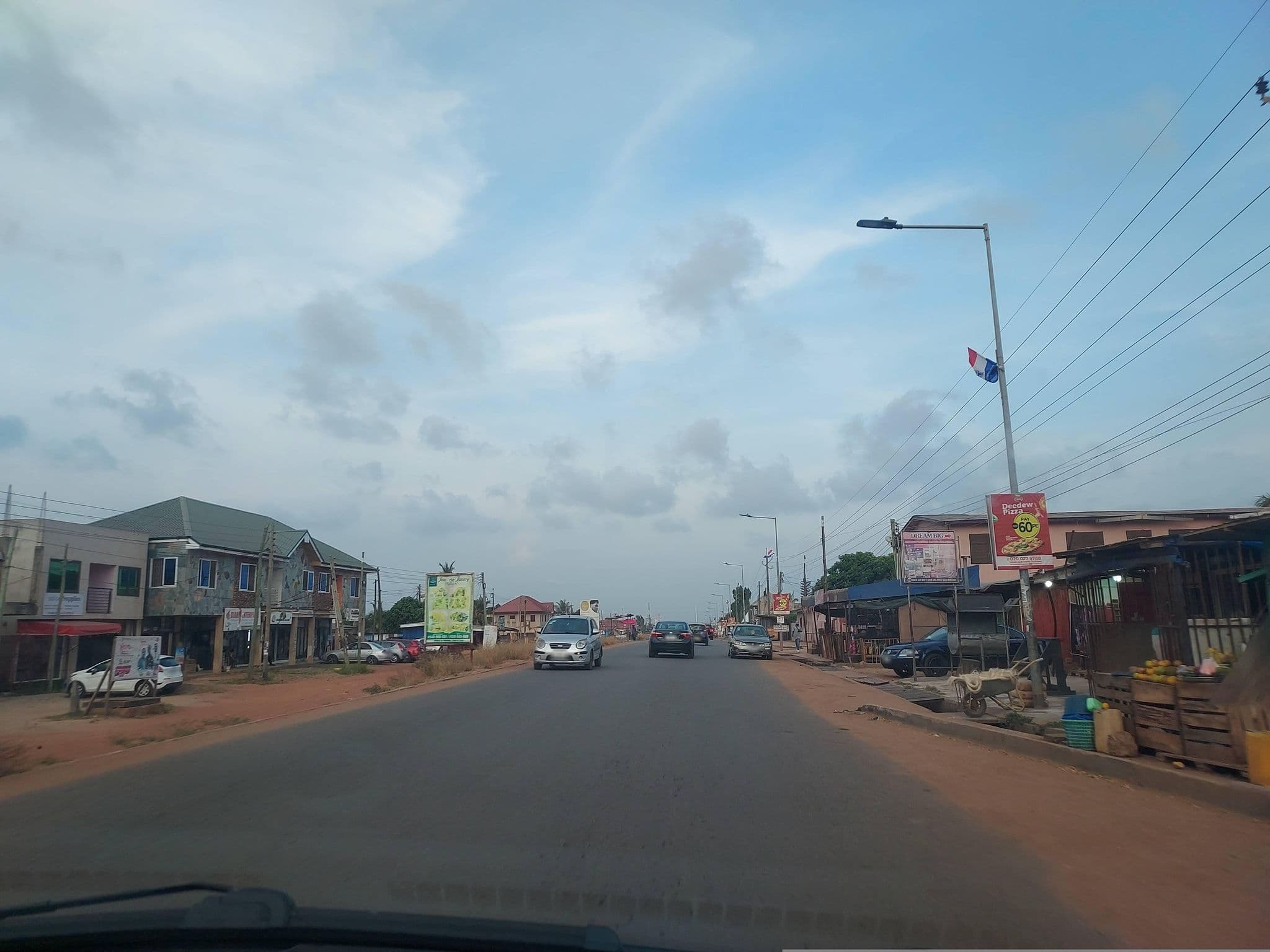 Street view near The Lon Mission, Teshi Old Town — © Berchiepratt03 (CC BY-SA · Mapillary)