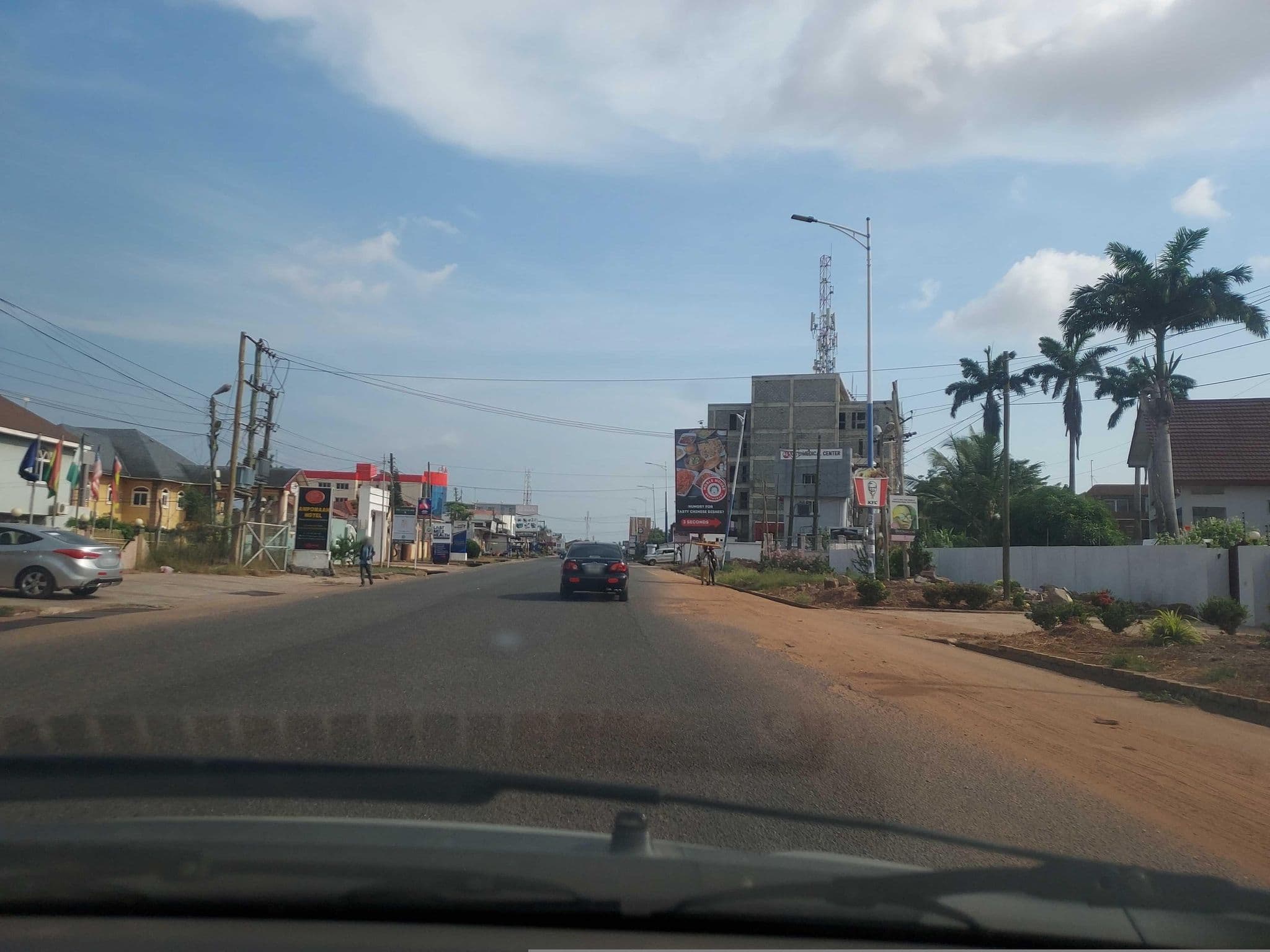Street view near Ampomah Hotel, Medina Estates
