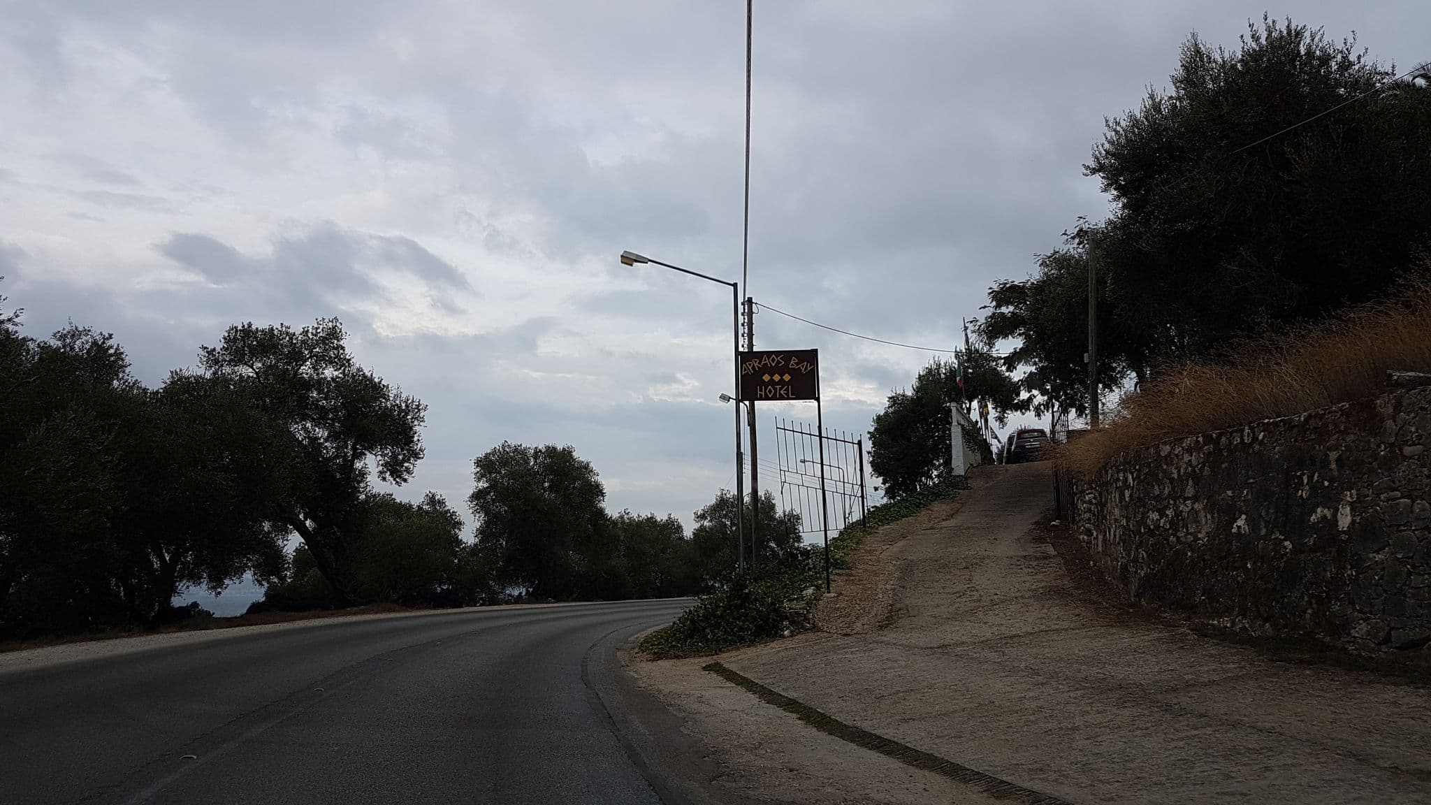 Street view near Apraos Bay Hotel, Acharávi — © teddy73 (CC BY-SA · Mapillary)