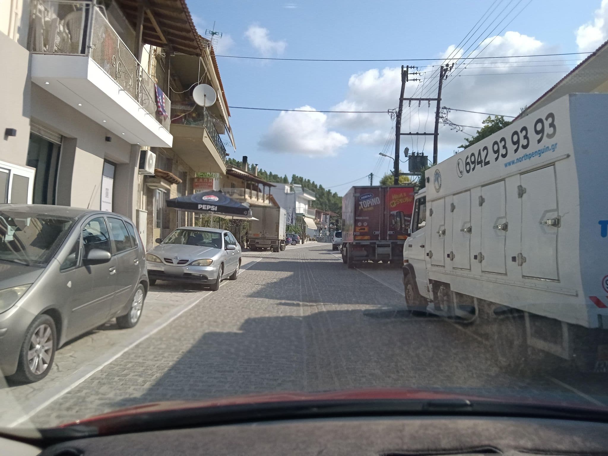 Street view near Iris Apartments, Kassándreia — © nglf (CC BY-SA · Mapillary)
