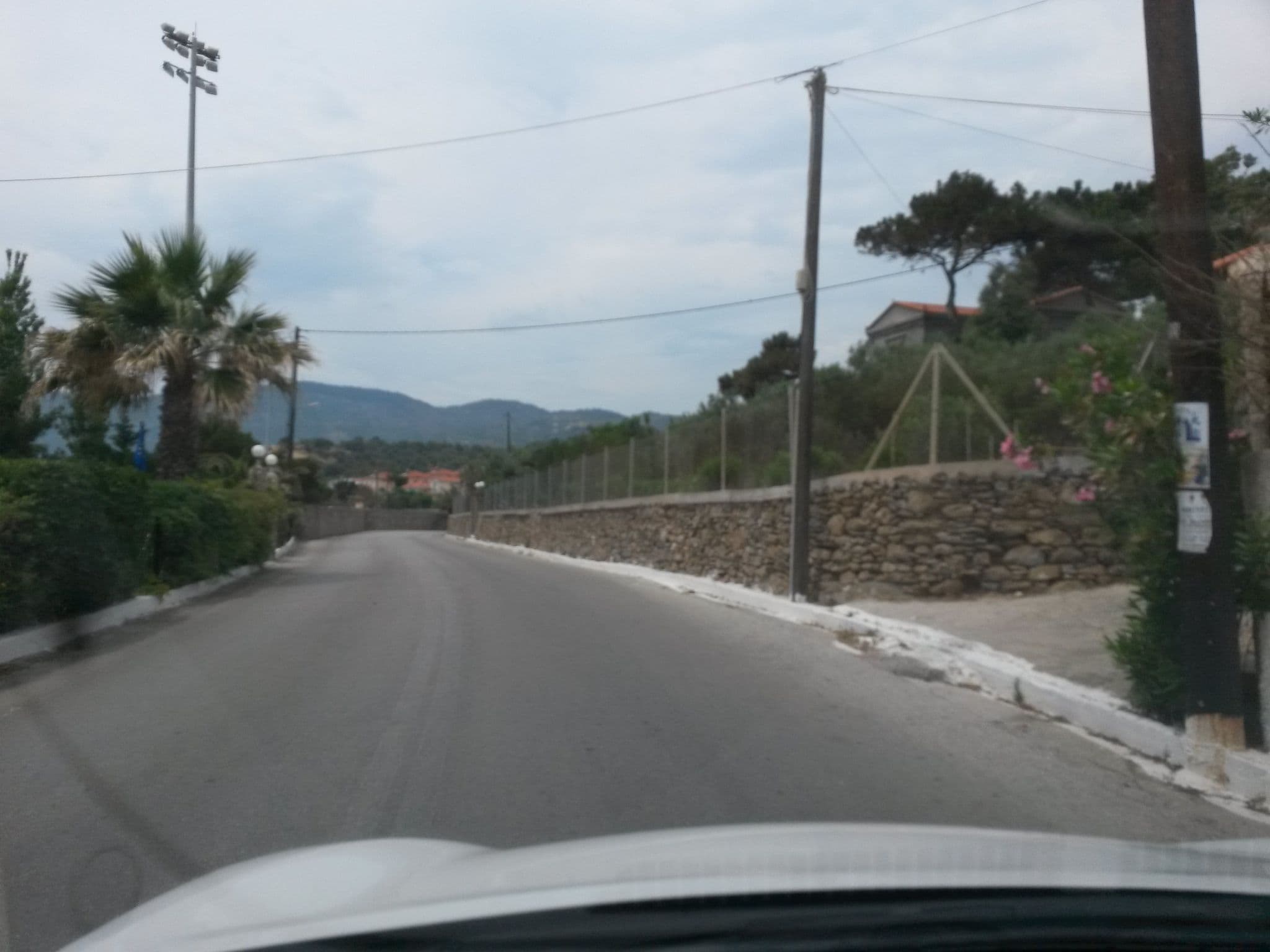 Street view near Pebble Beach, Plomári — © kay_d (CC BY-SA · Mapillary)